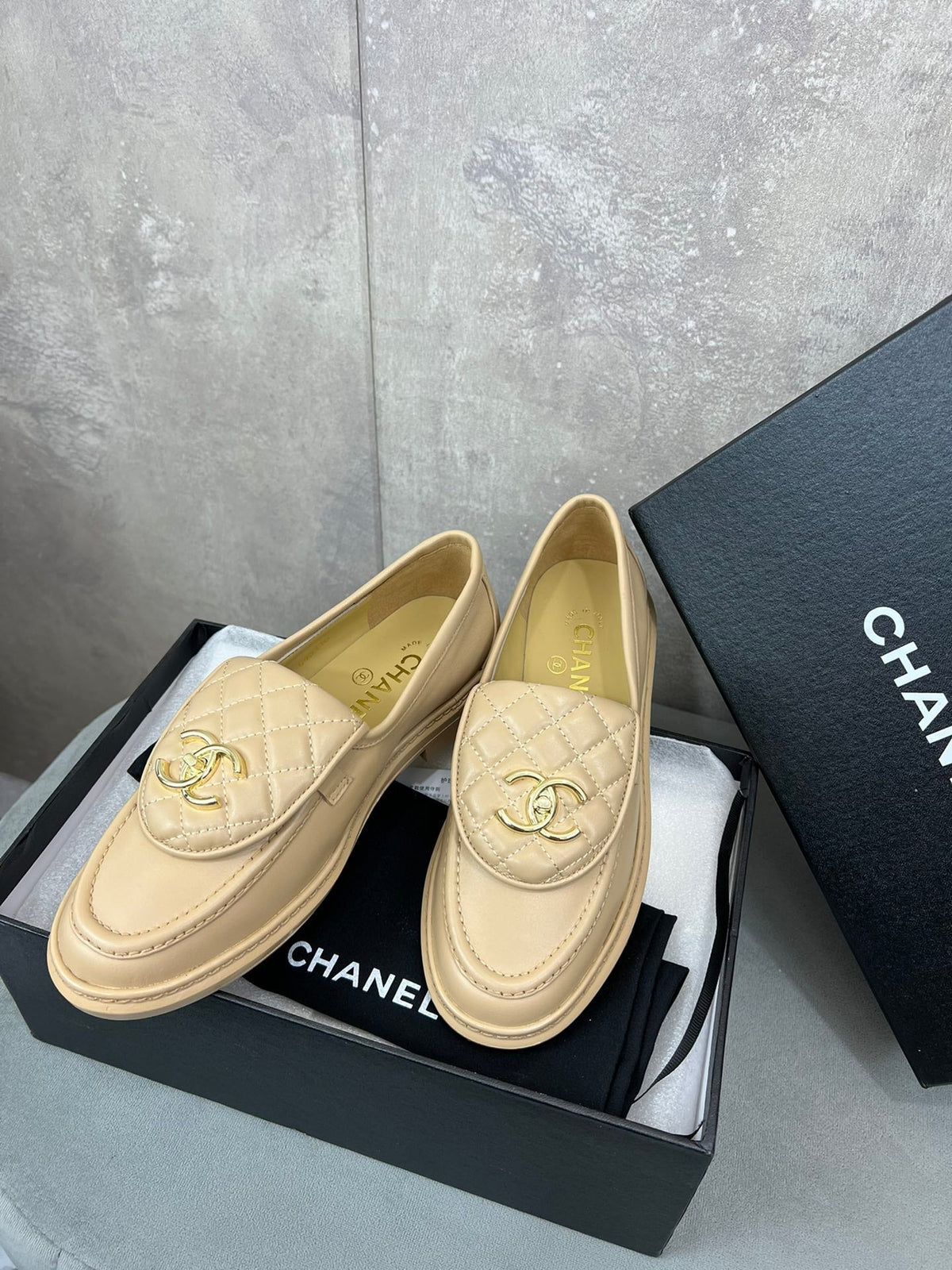 Chanel 26s Loafers In Beige Quilted Calfskin With CC Logo