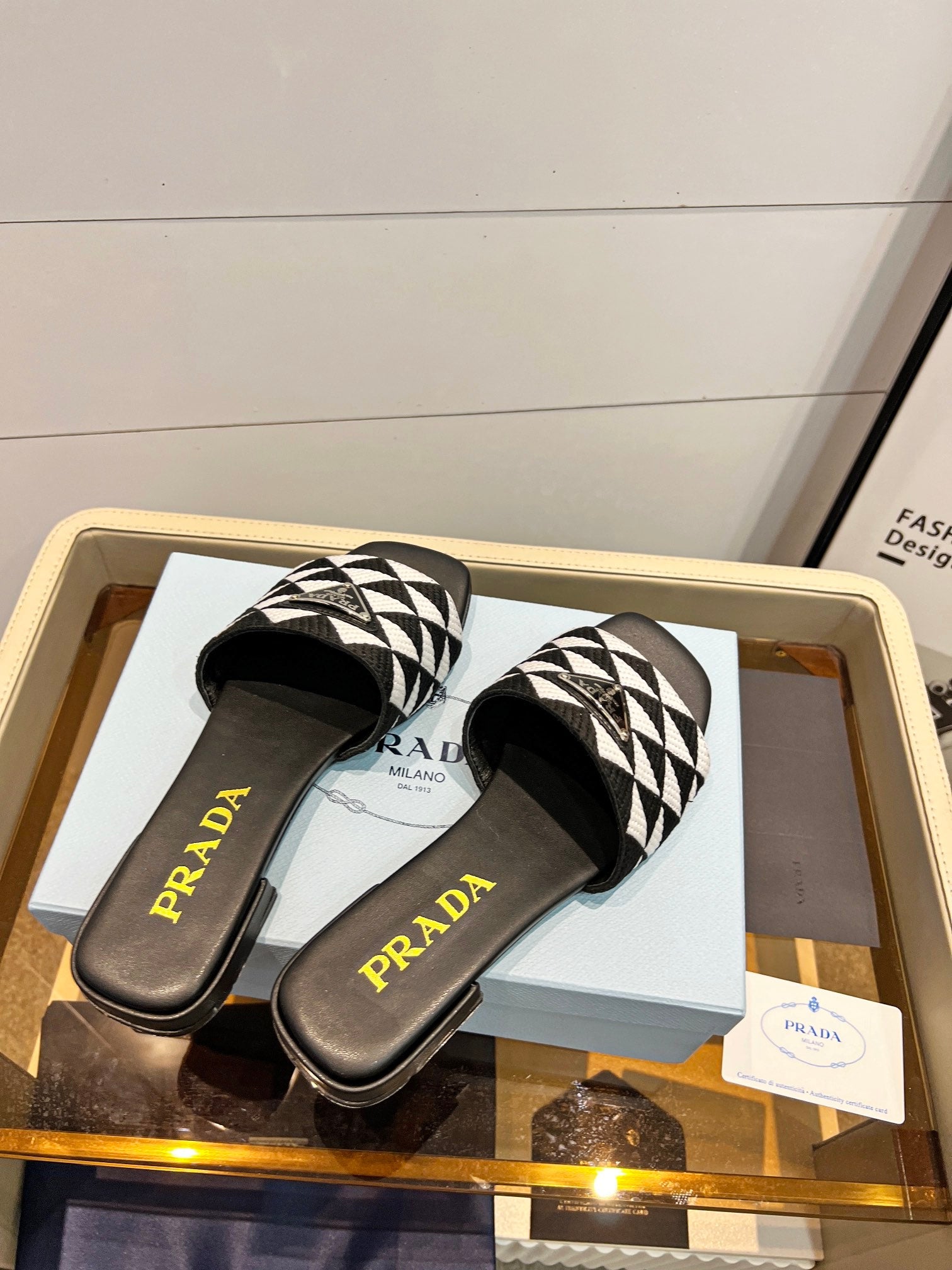 Prada 26s Enameled Metal Triangle Printed Slides White Black Leather Cotton 986589