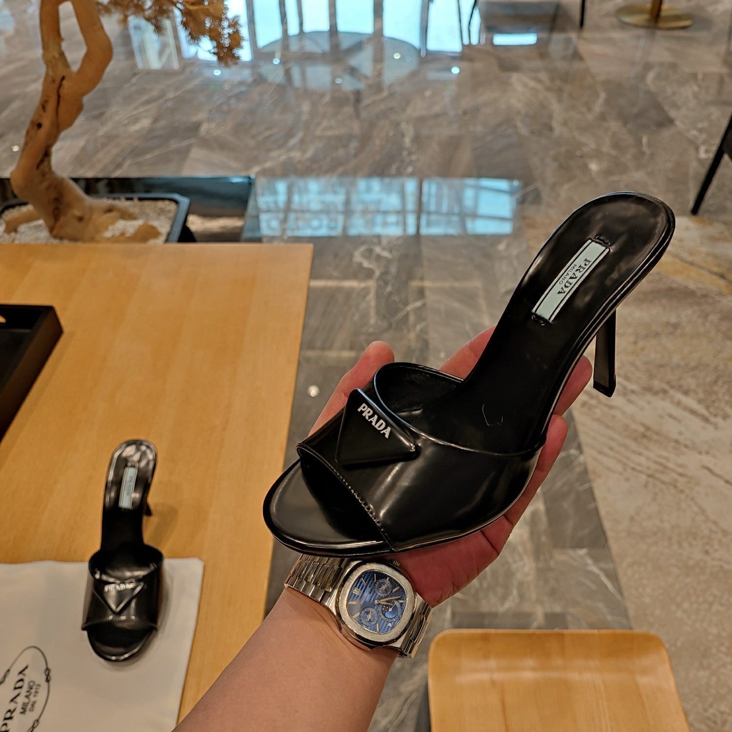 Prada 26S Open-Toe Mules 100mm in Black Patent Calfskin with Logo