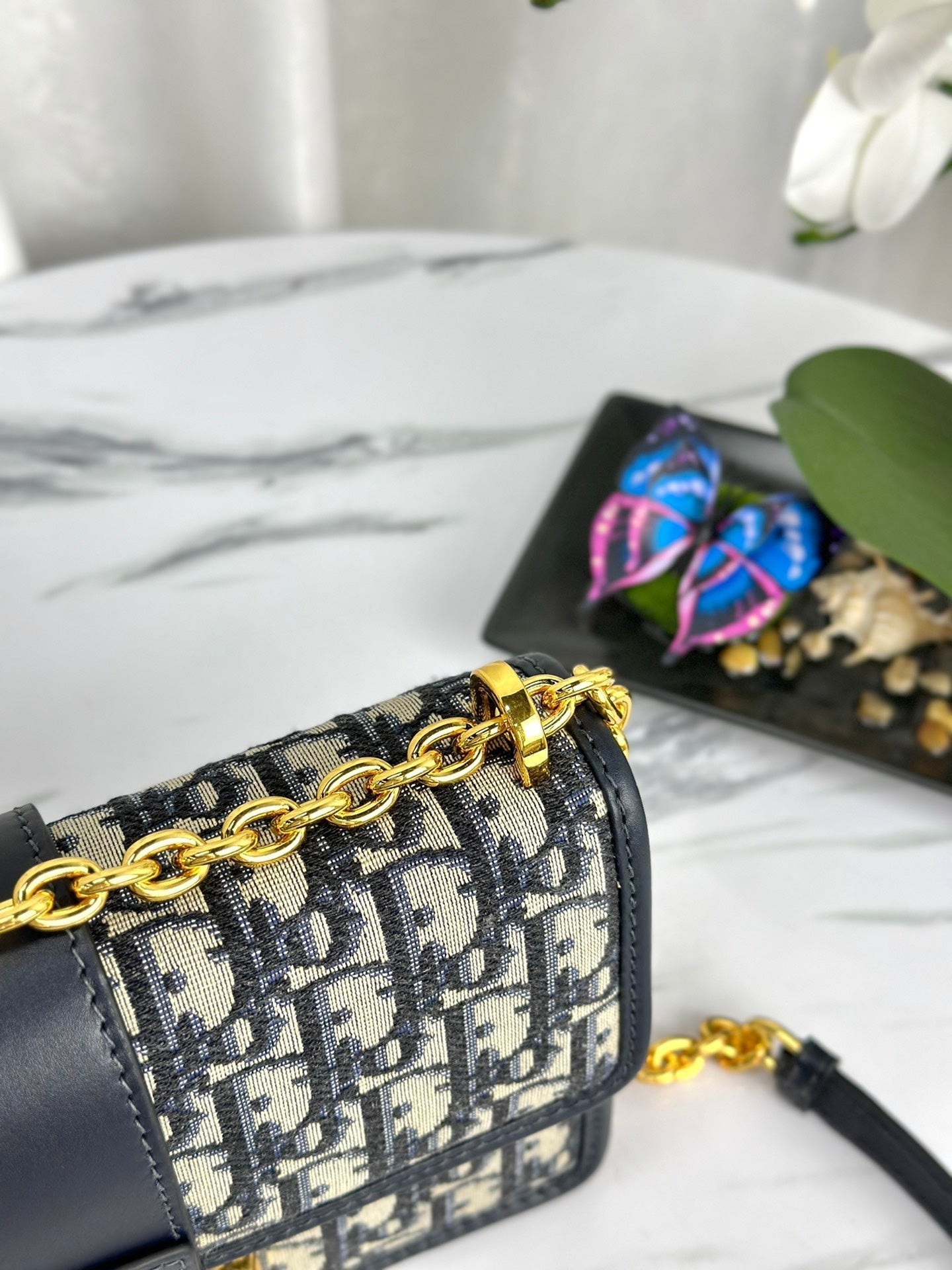 MONTAIGNE 25 BAG IN BLUE OBLIQUE JACQUARD