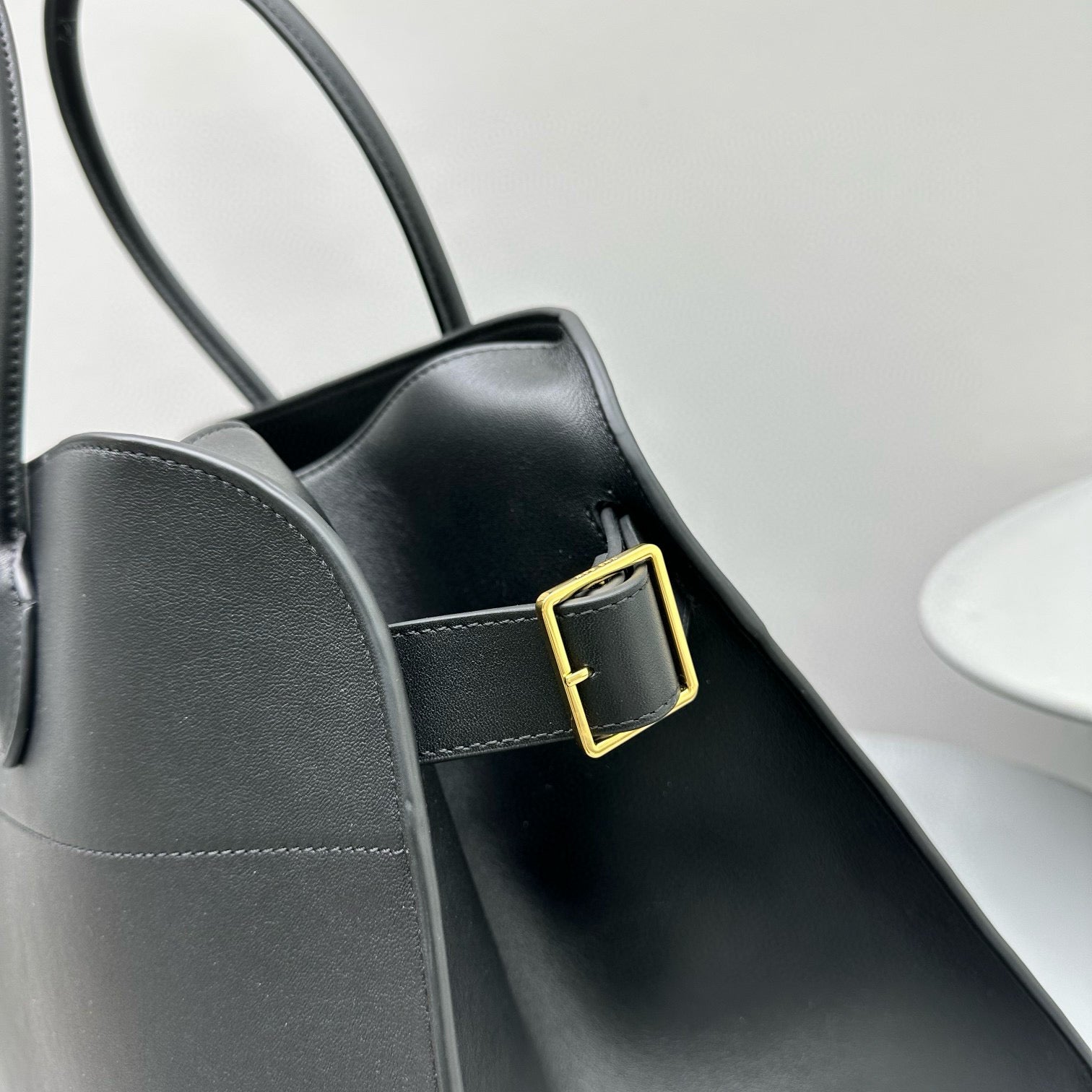 The Row Margaux 17 Black Cowhide