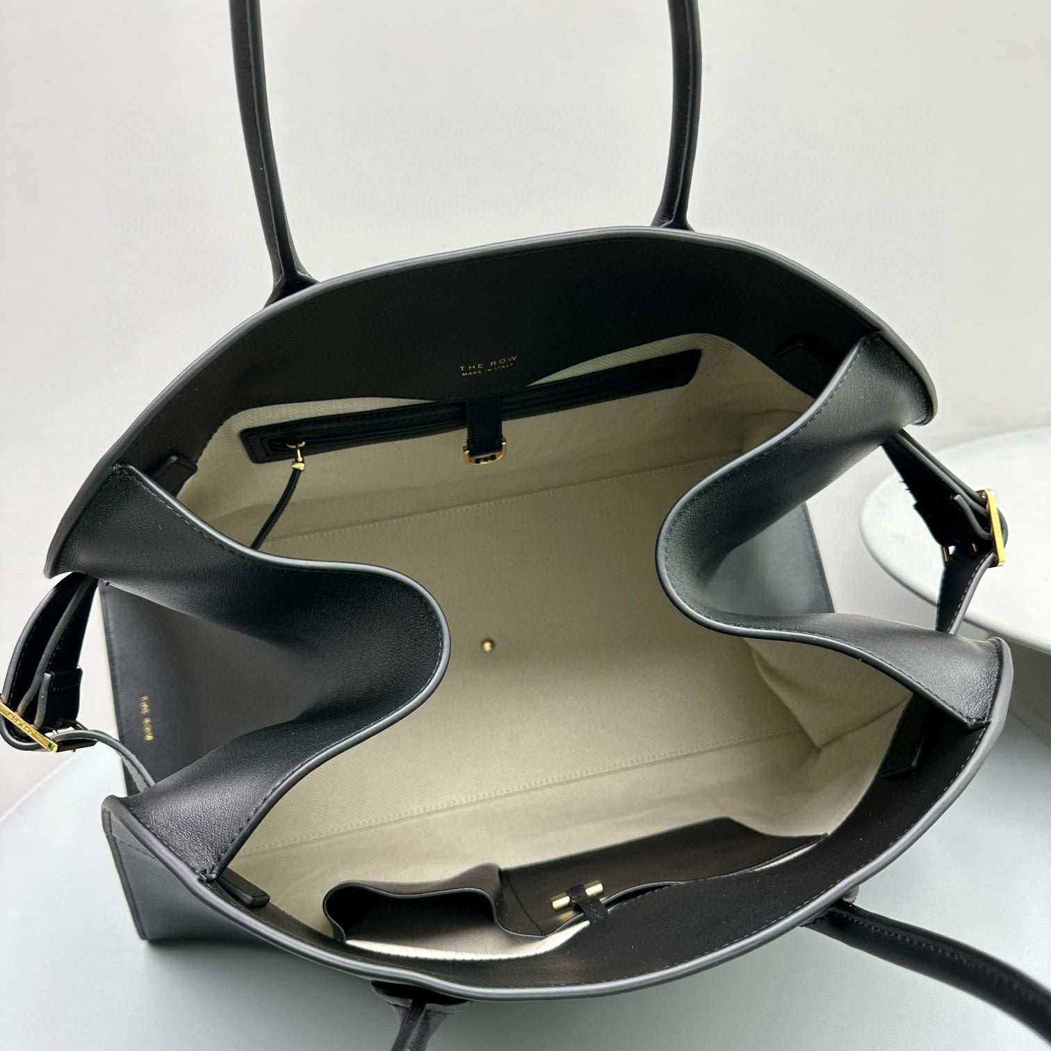The Row Margaux 17 Black Cowhide