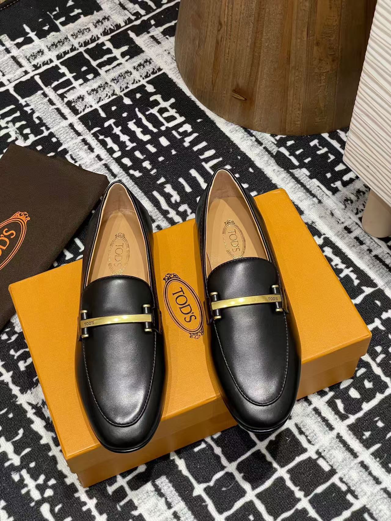 Tod's 25 Metal-bar Loafers Black Calfskin 206875