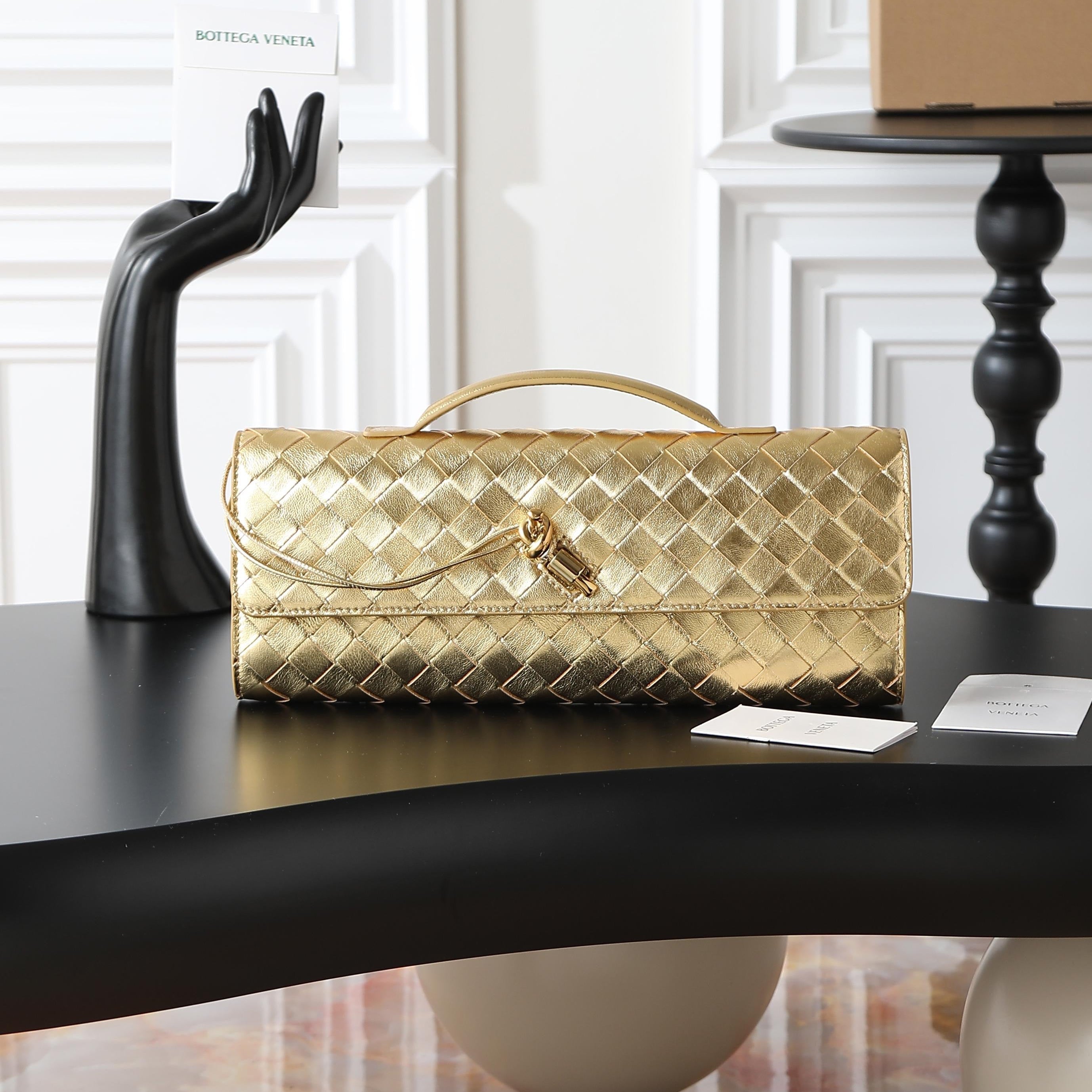 Andiamo Clutch 31cm Gold Intrecciato Leather