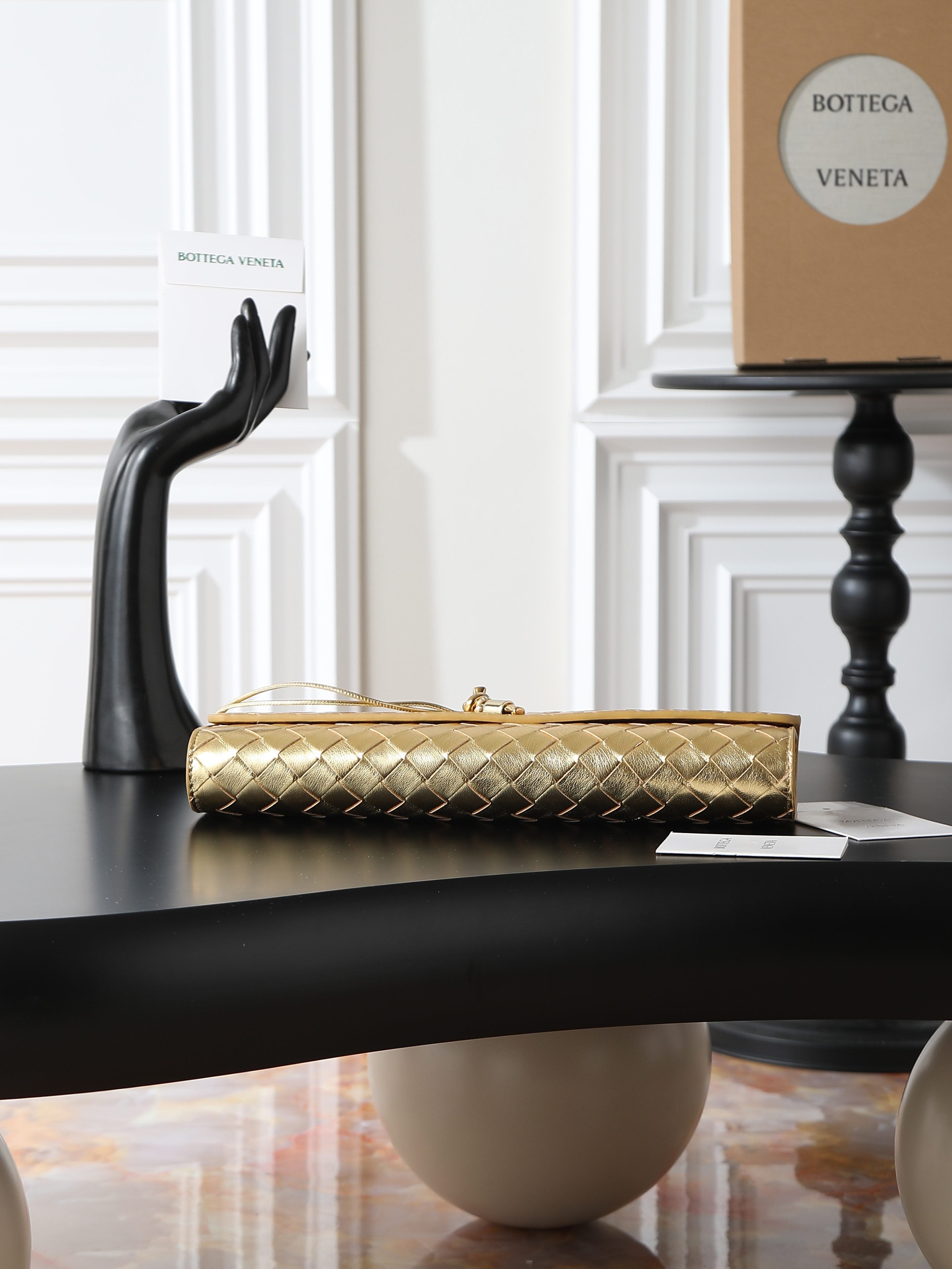 Andiamo Clutch 31cm Gold Intrecciato Leather