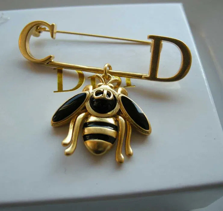 CD Brooch 11