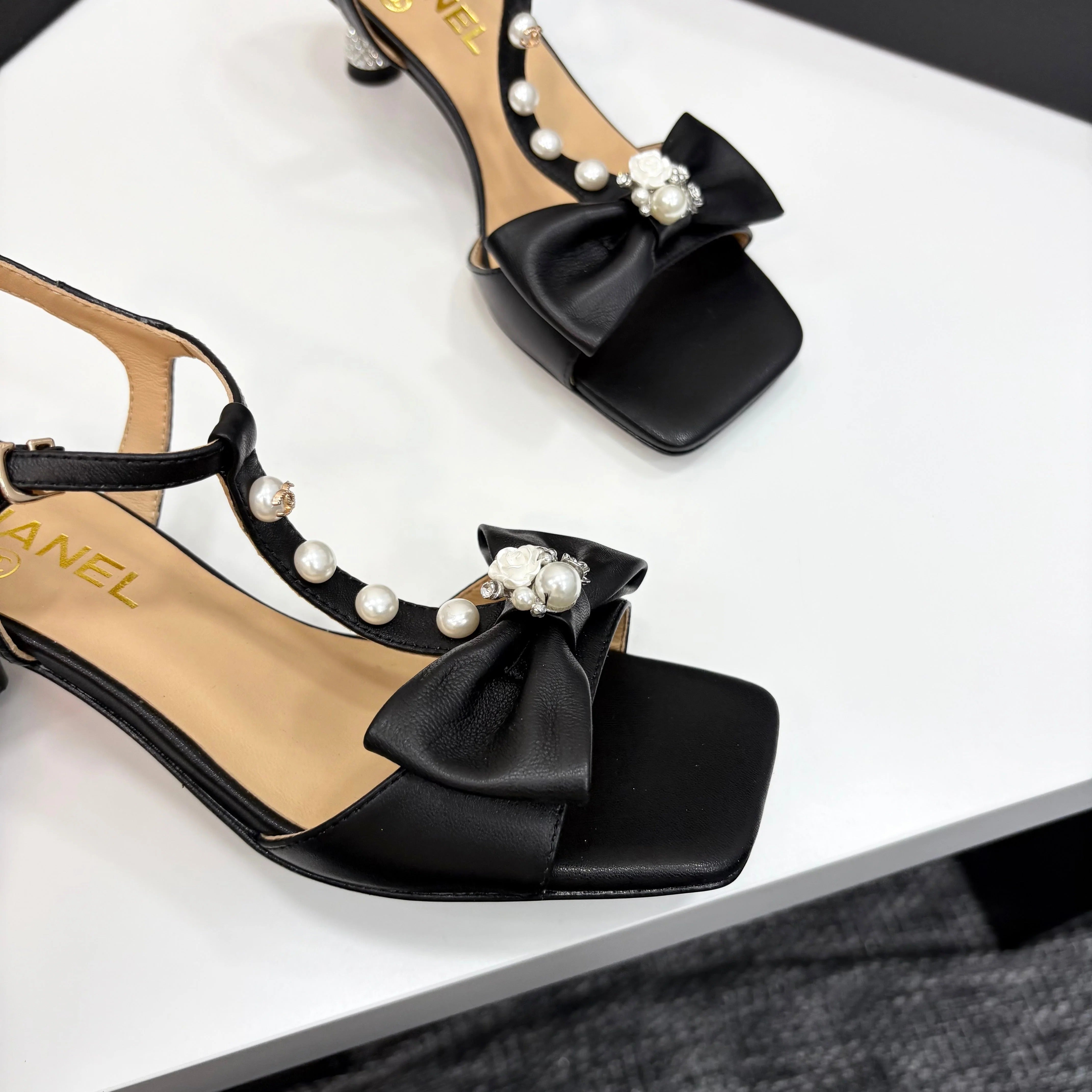 CC 2026 Bow Pearl Sandal Black Sheepskin
