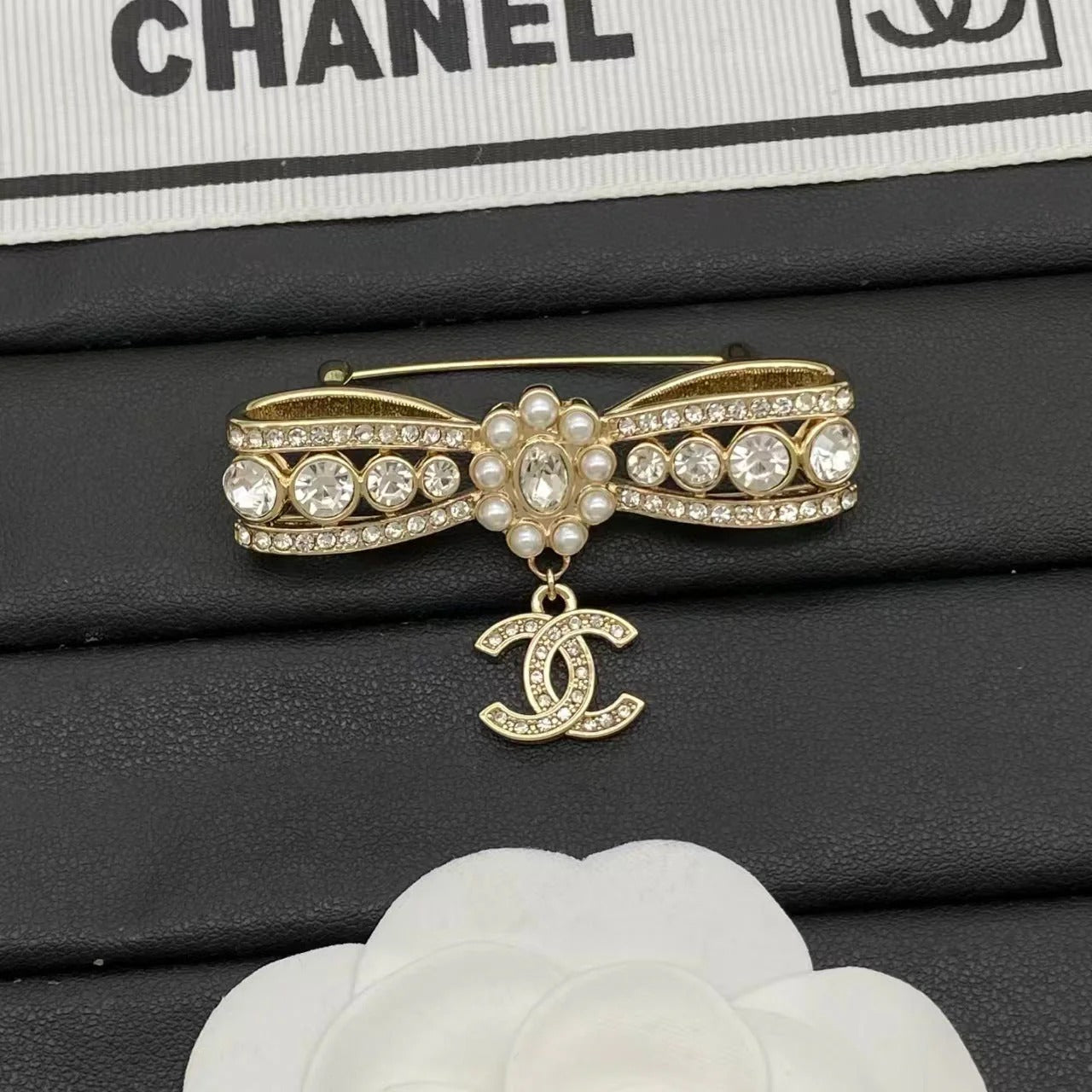 Chanel Bow Brooch with CC Pendant