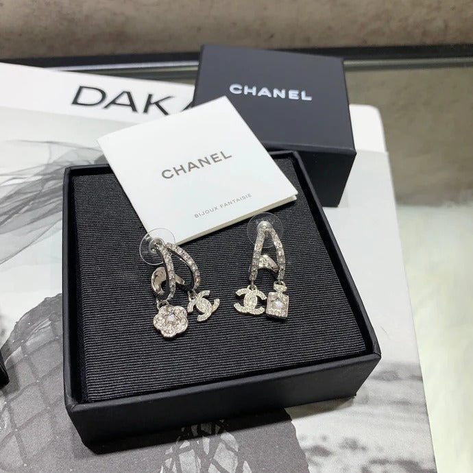 Chanel Silver Asymmetrical Earrings