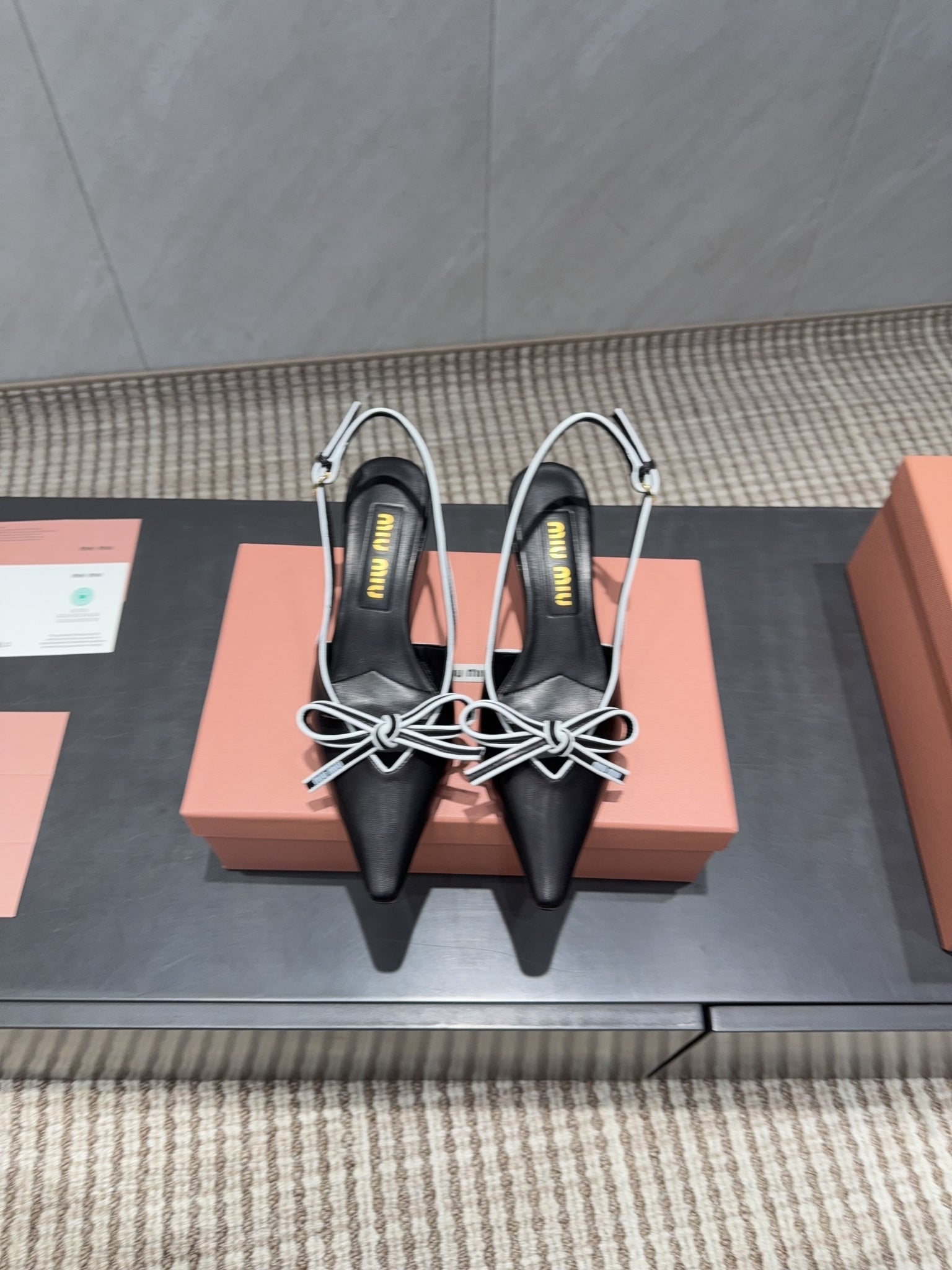 Miu 26s Slingback 55mm In Black White Calfskin With Bow
