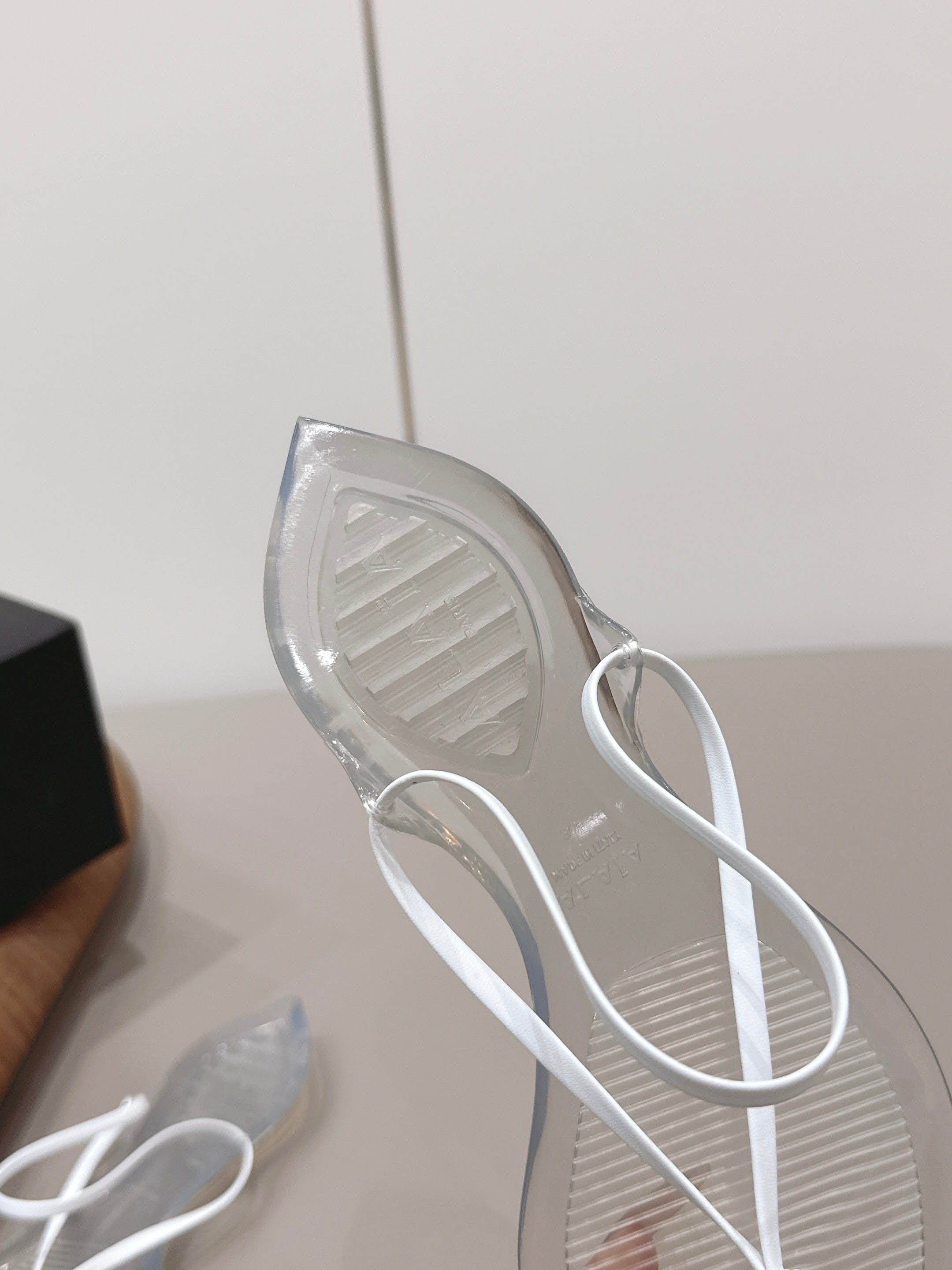 Alaïa Invisible Thong Mules White Leather 738664