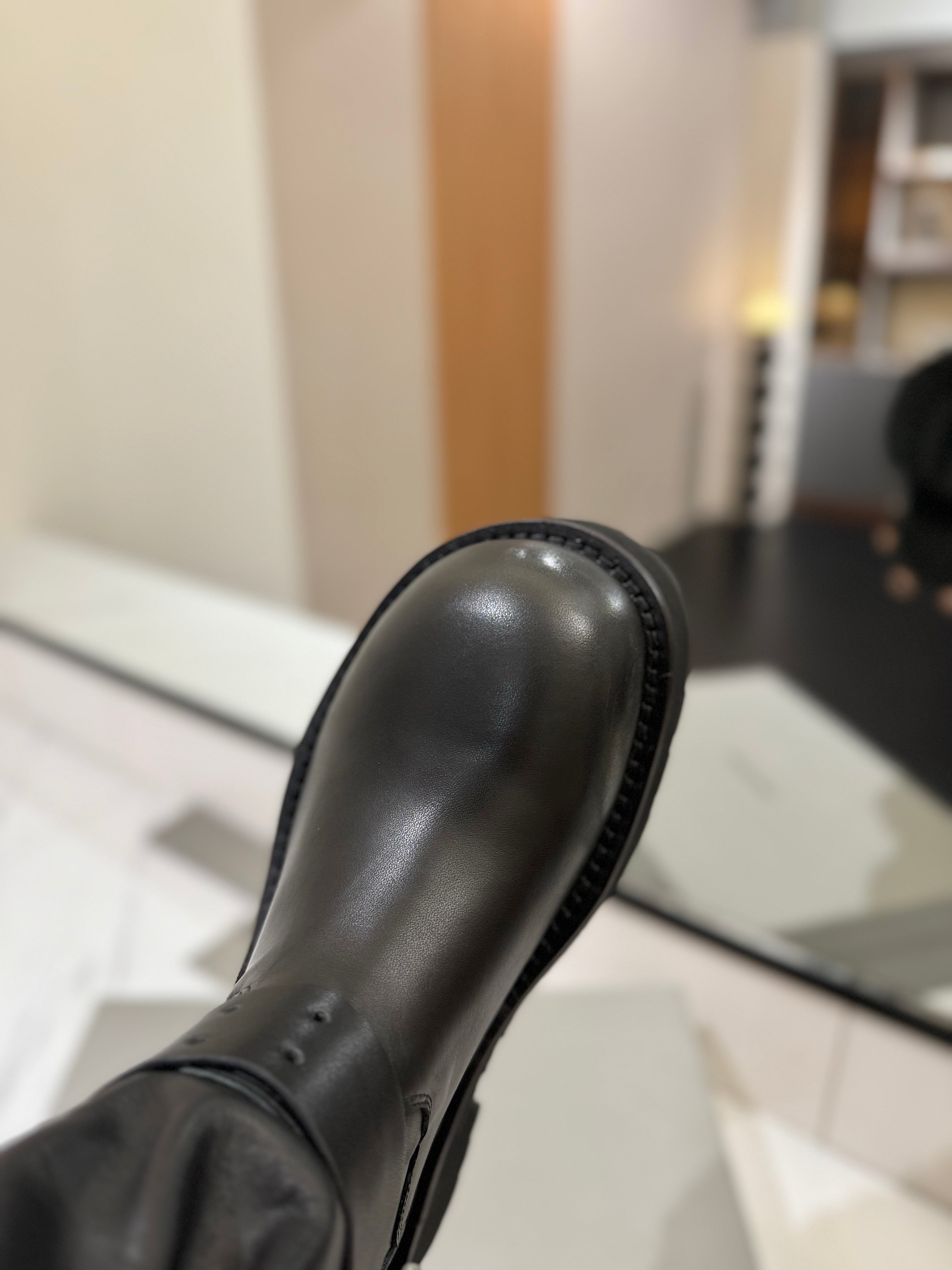 Balenciaga 25s buckled high boots black calfskin 467611