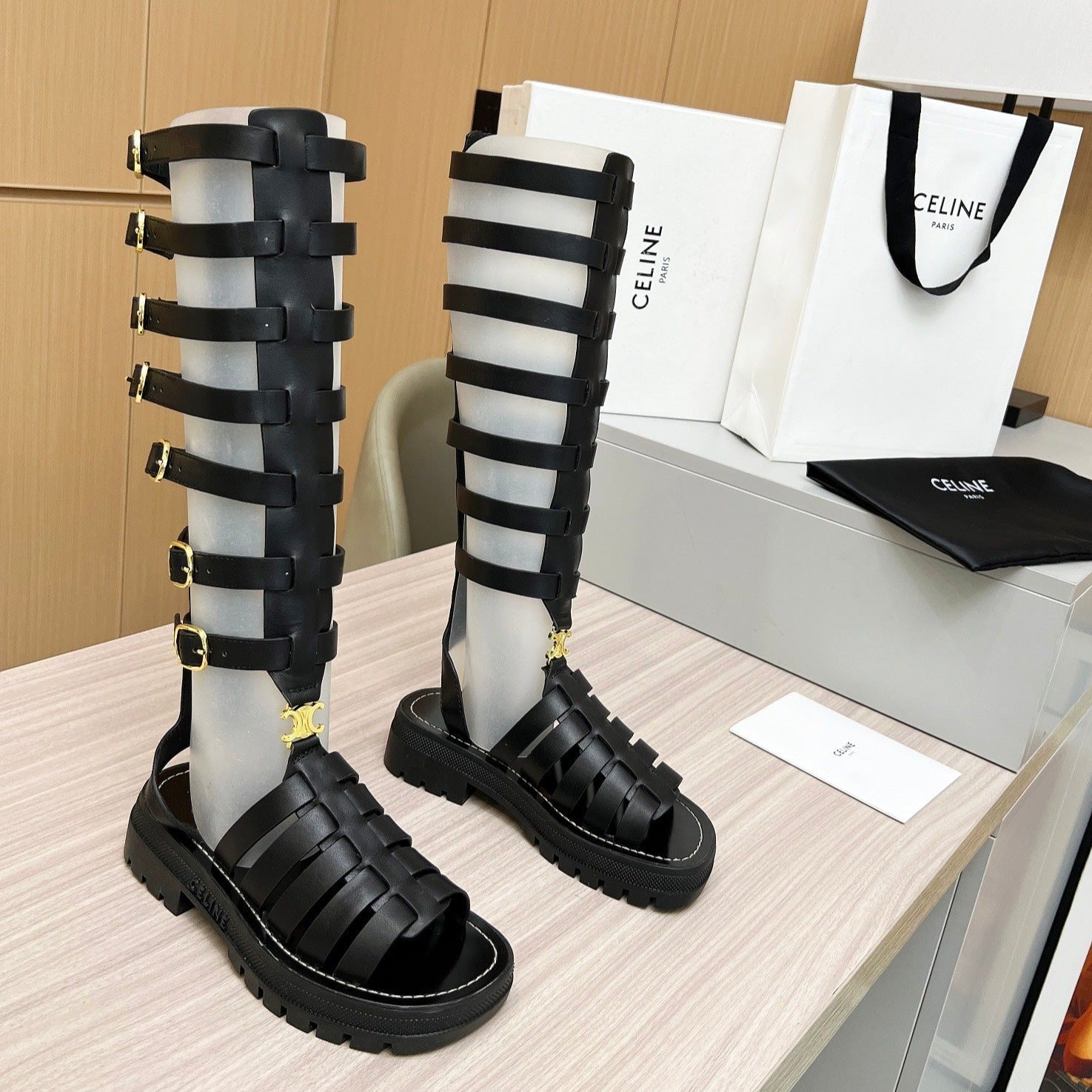 Triomphe high boots leather buckles Black
