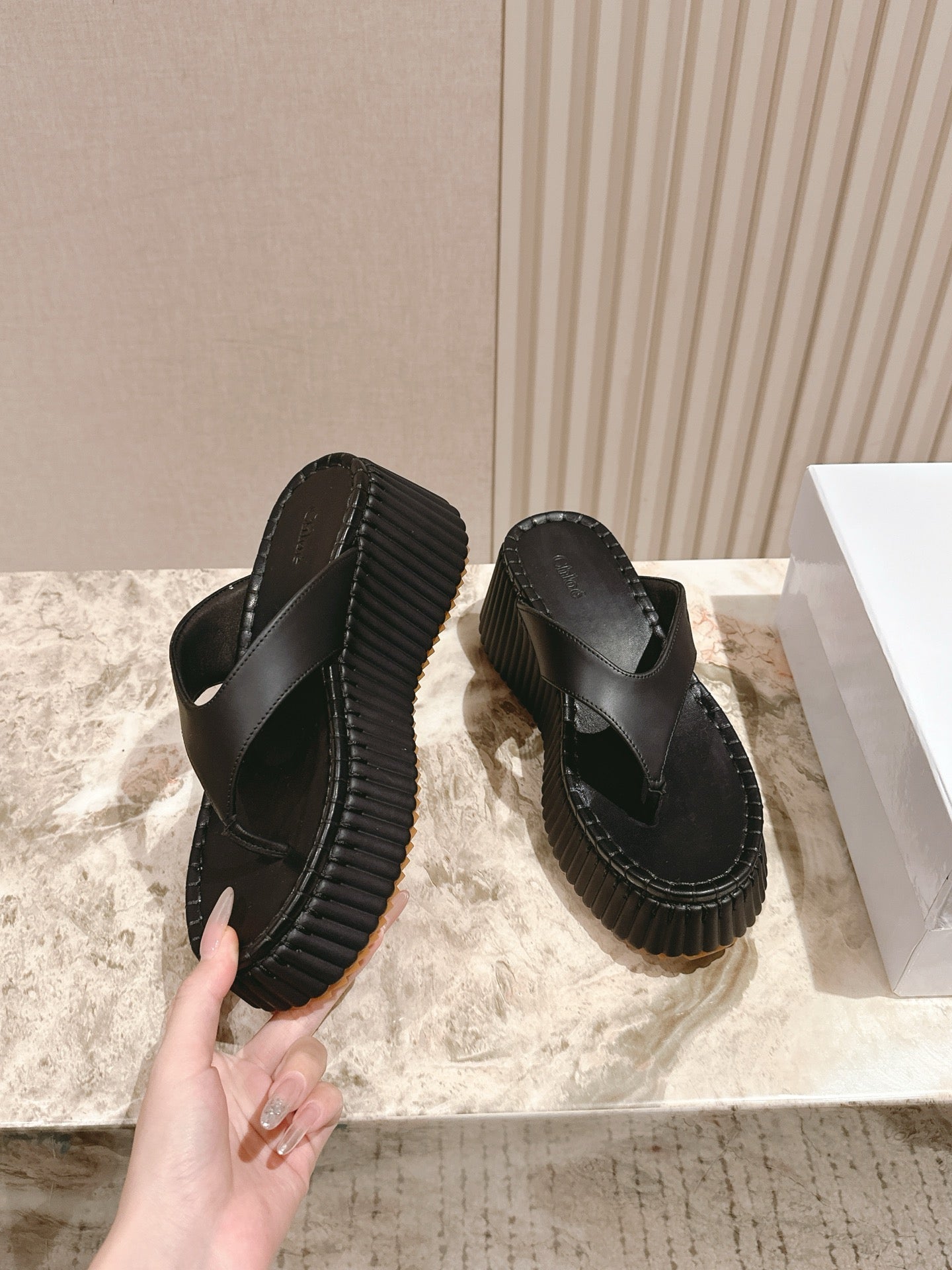 Chloé 26S Platform Flip-Flops in Black Lambskin.