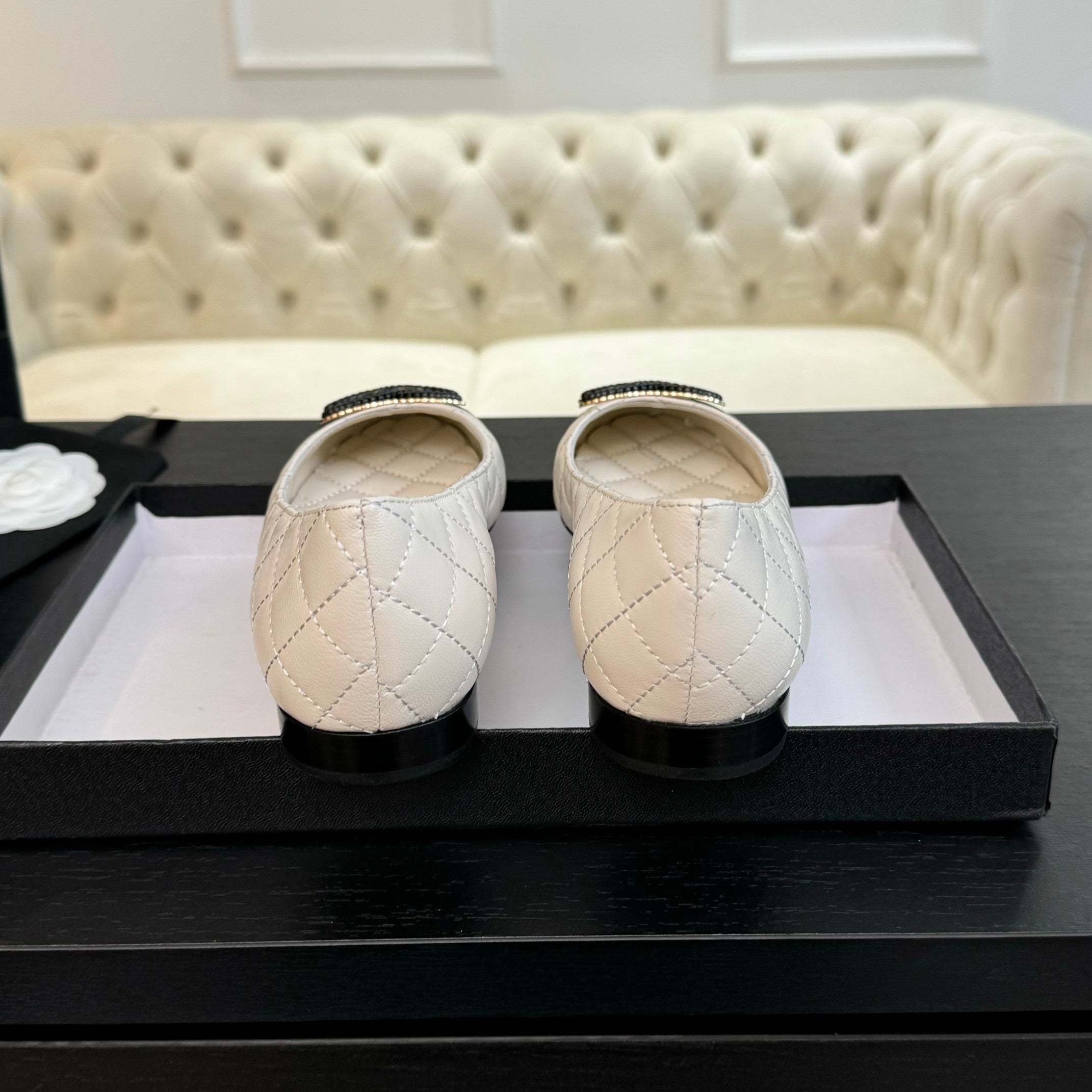 ballet flat white quilted lambskin large black cc logo