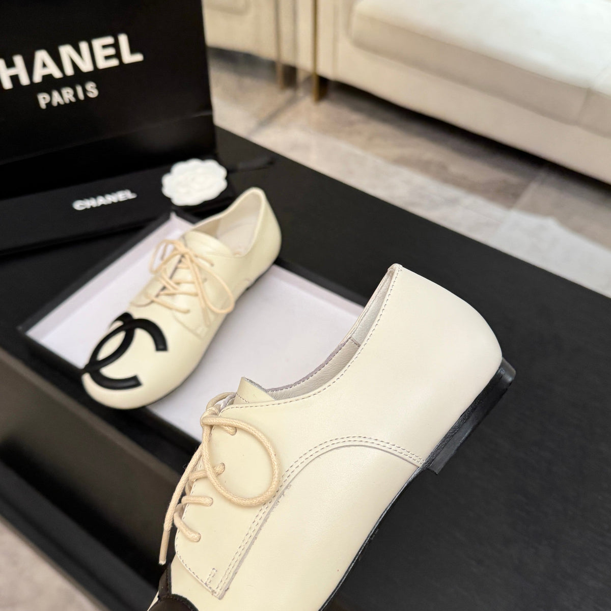 Chanel 26s Cambon Oxfords Cream Black Leather 168046