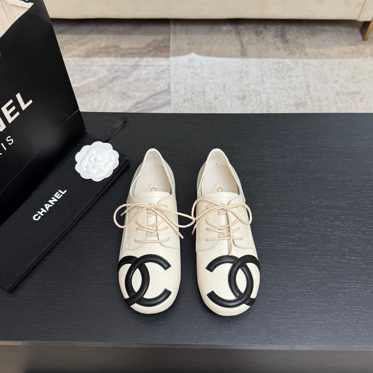 Chanel 26s Cambon Oxfords Cream Black Leather 168046