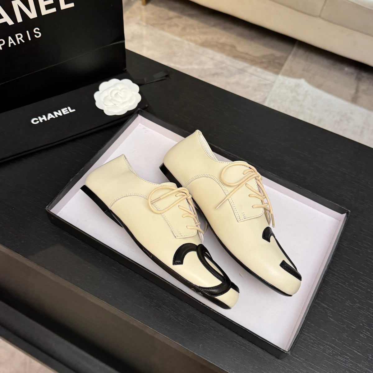 Chanel 26s Cambon Oxfords Cream Black Leather 168046
