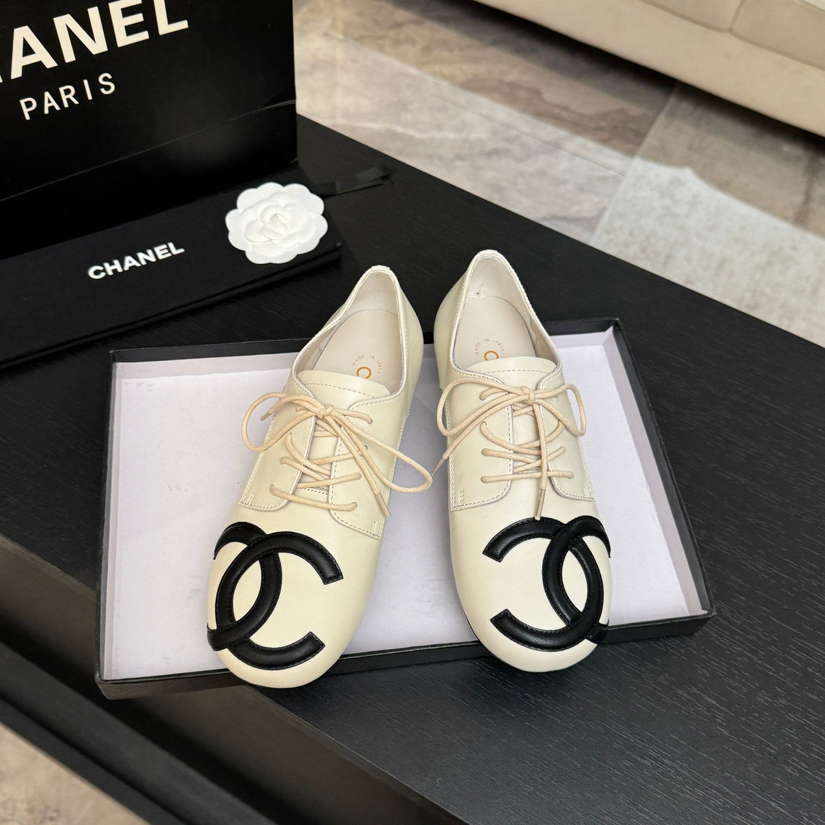 Chanel 26s Cambon Oxfords Cream Black Leather 168046