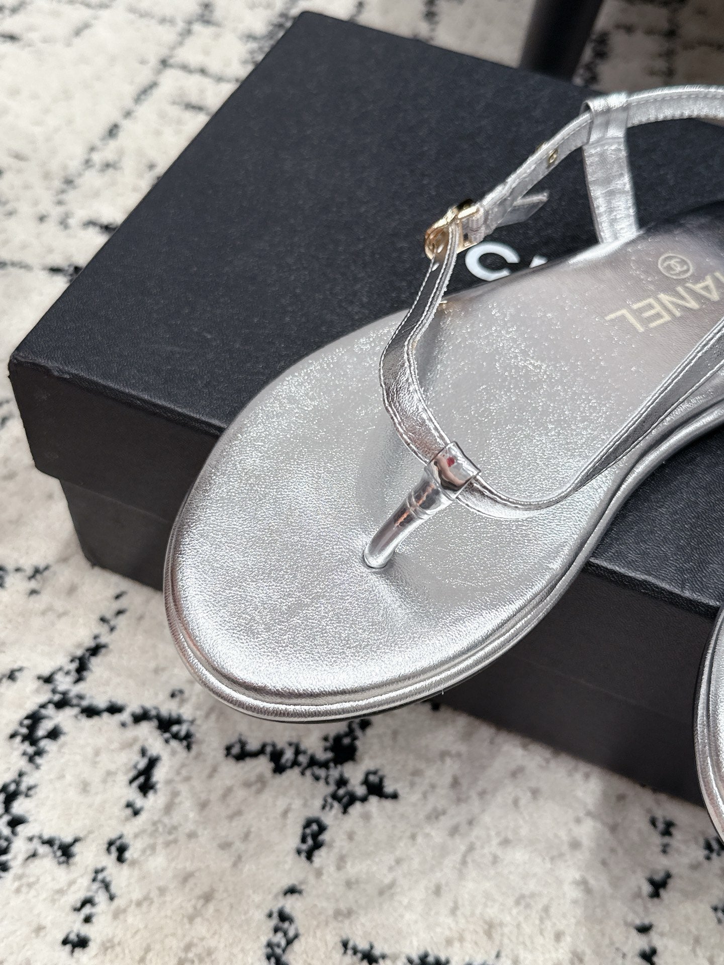 Chanel 26S Thong Sandals In Silver Calfskin With Gold Hardware