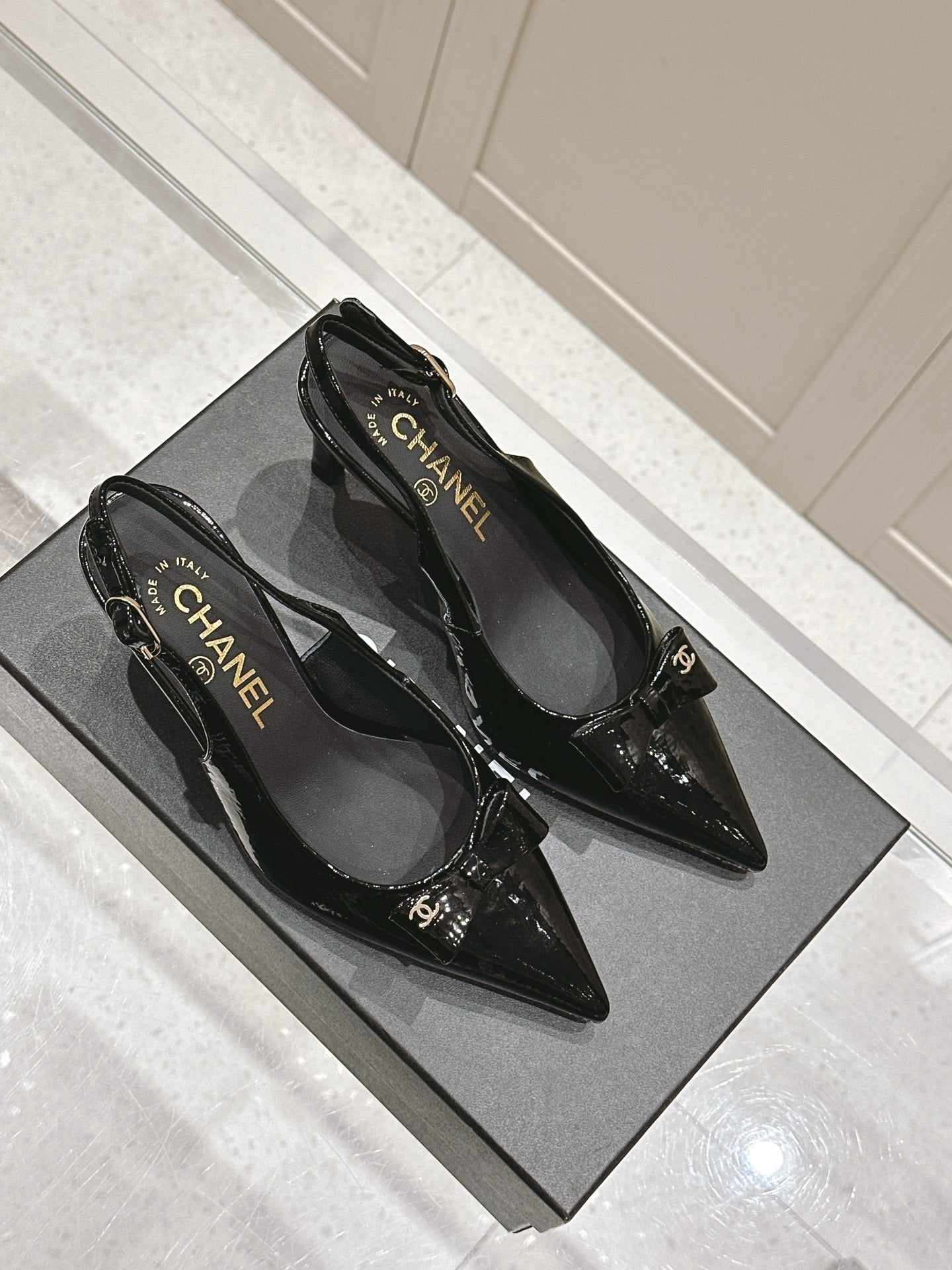 Chanel 25A Slingback Black Patent Calfskin 393073
