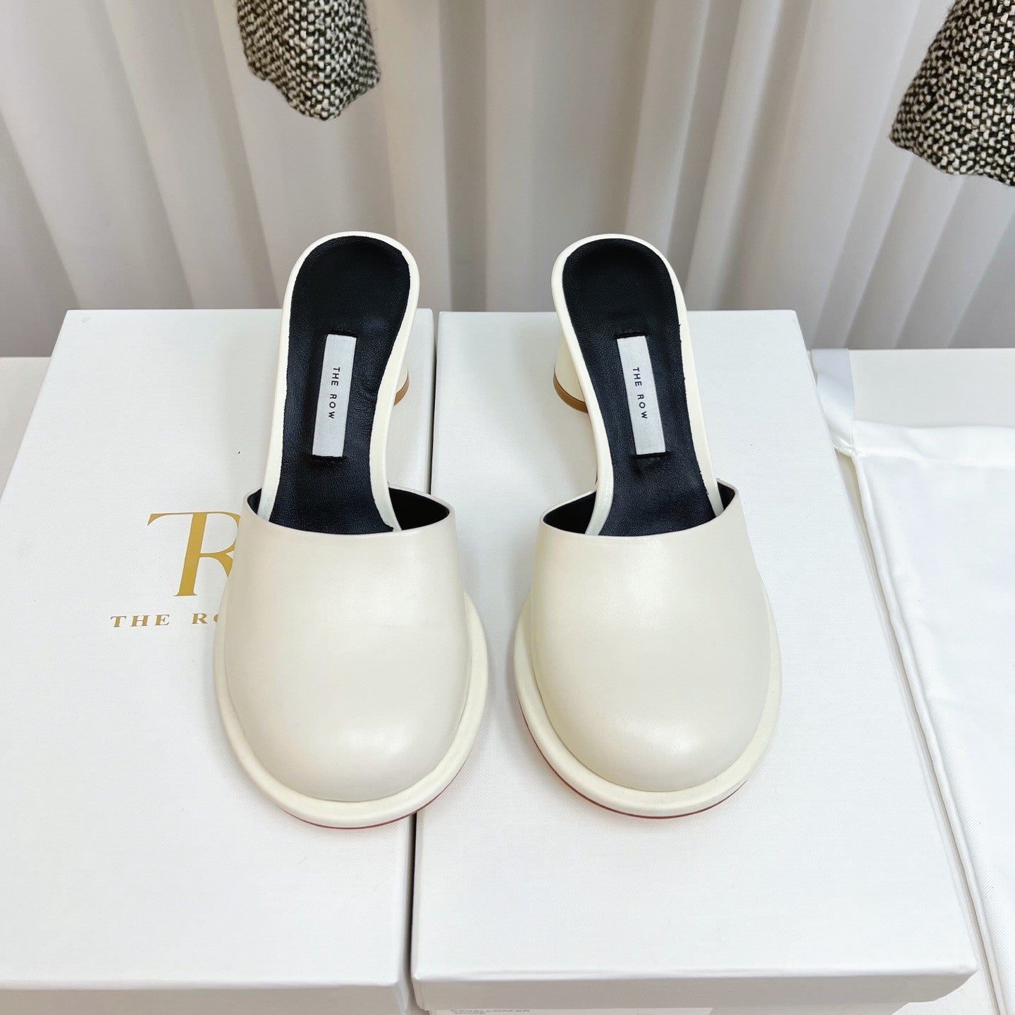 The Row Mules 50mm White Black Sheepskin 324740