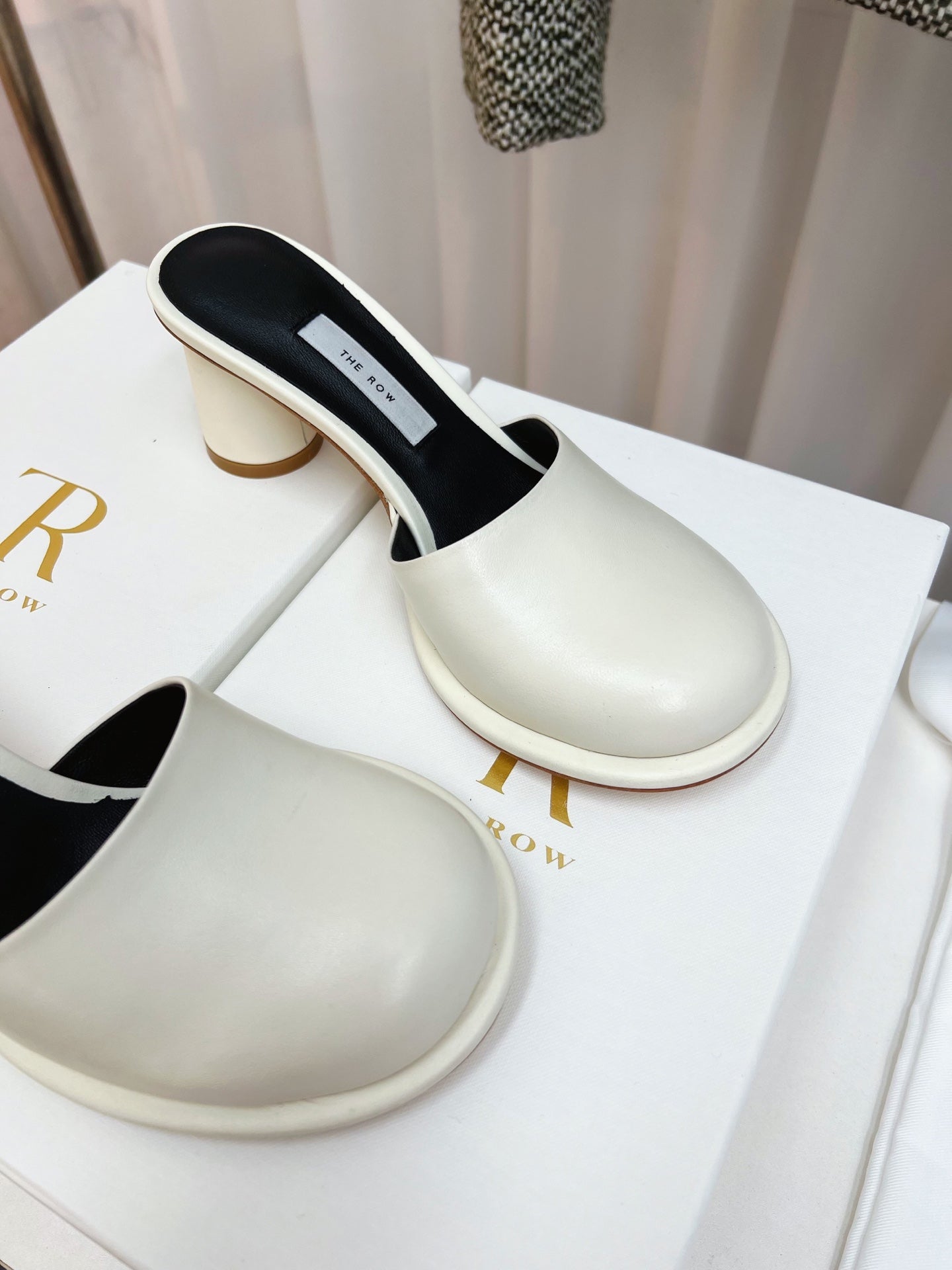 The Row Mules 50mm White Black Sheepskin 324740