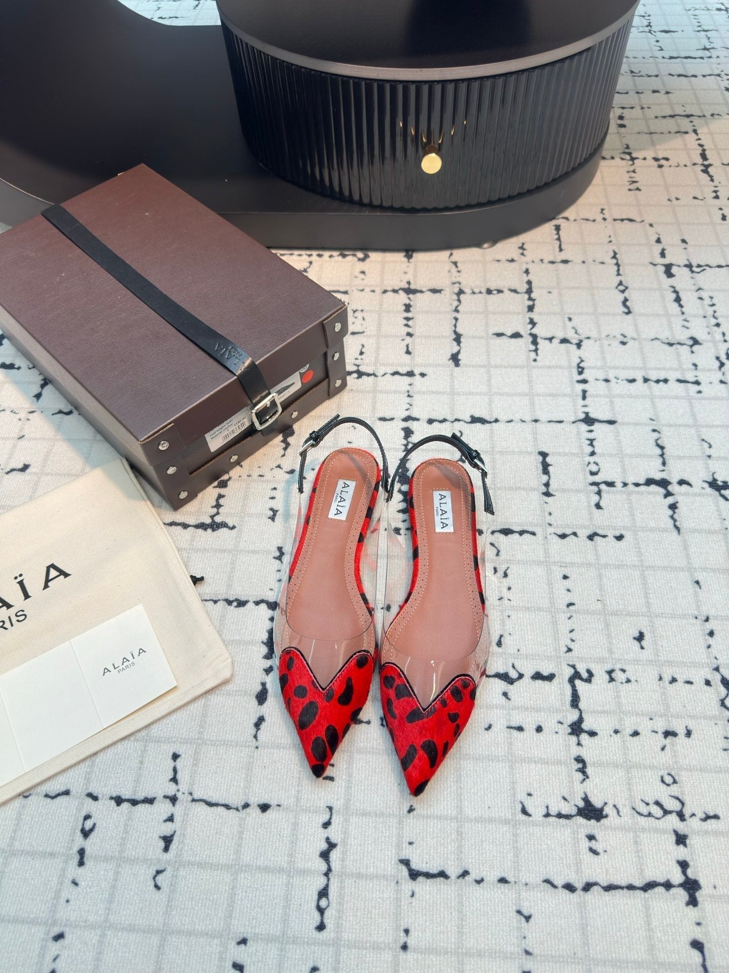 ALAIA FLAT SLINGBACK IN CHERRY RED HORSE HAIR AND FILM