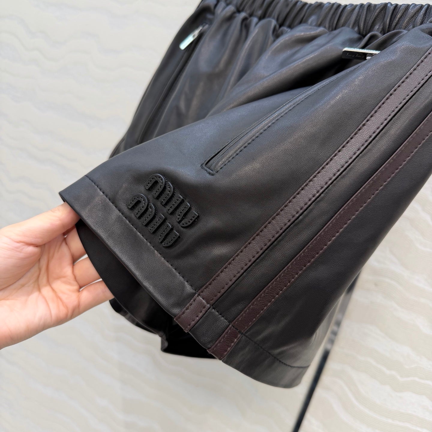Miu SS26 Striped Nappa Leather Shorts Black Lambskin 351112