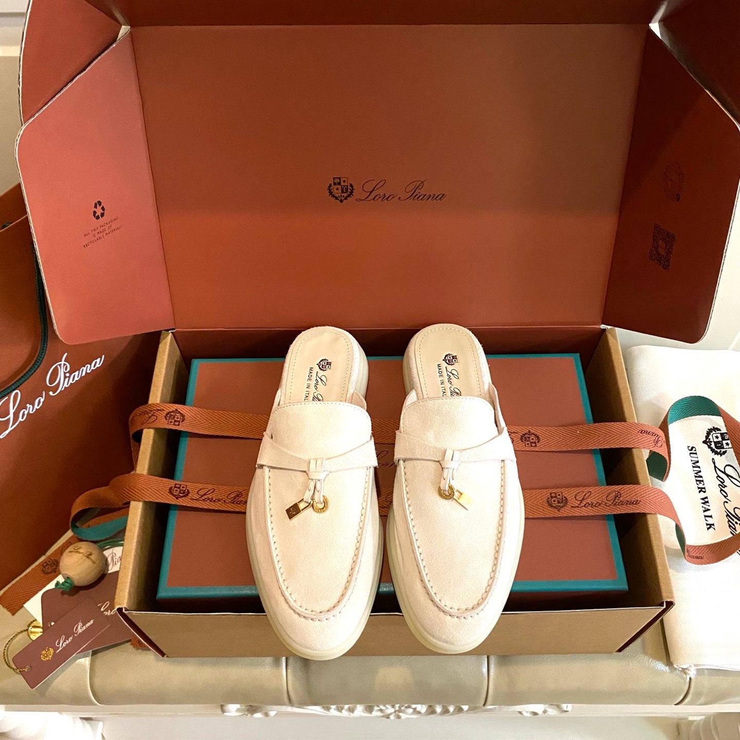 LP 26s Lock Charm Mules In Beige Suede Gold Hardware