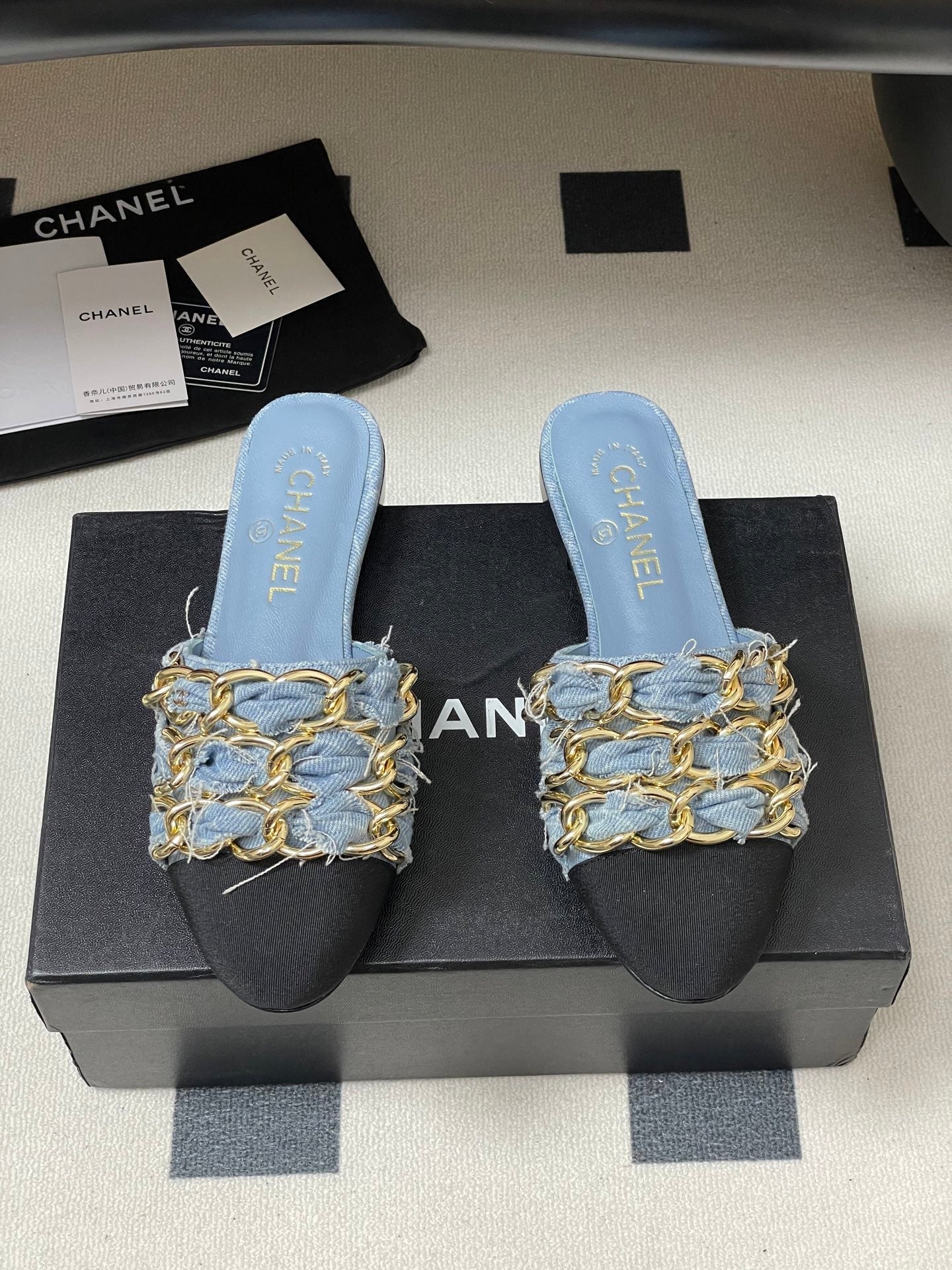 CC 25B Chain Closed Toe Flat Mule Light Blue Denim 393887