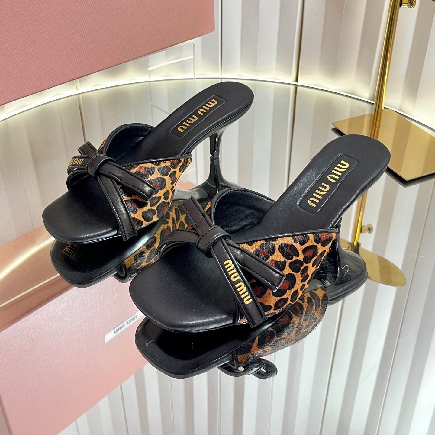 Miumiu 26s Mule Sandals 55mm In Leopard Print Calf Hair With Bow