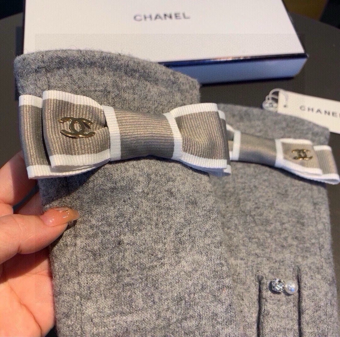 CC GLOVES IN PALE GRAY WOOL WITH BOW 463856