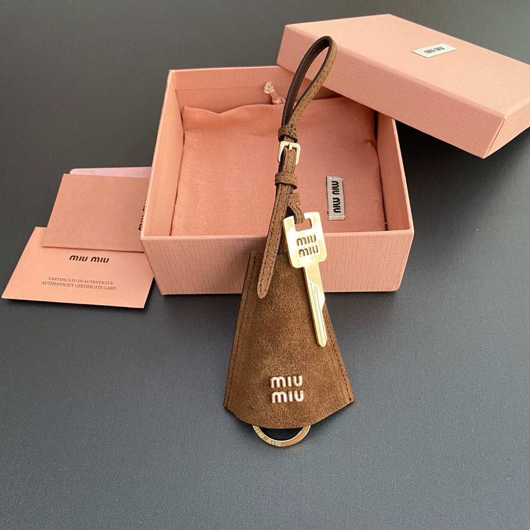 Leather Bag Charm With Key Brown Suede 240339