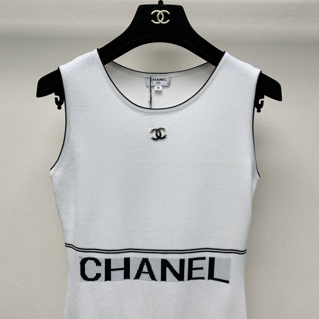 CC 25 Round Neck Knitted Embroidered Logo Vest Dress in White 277584
