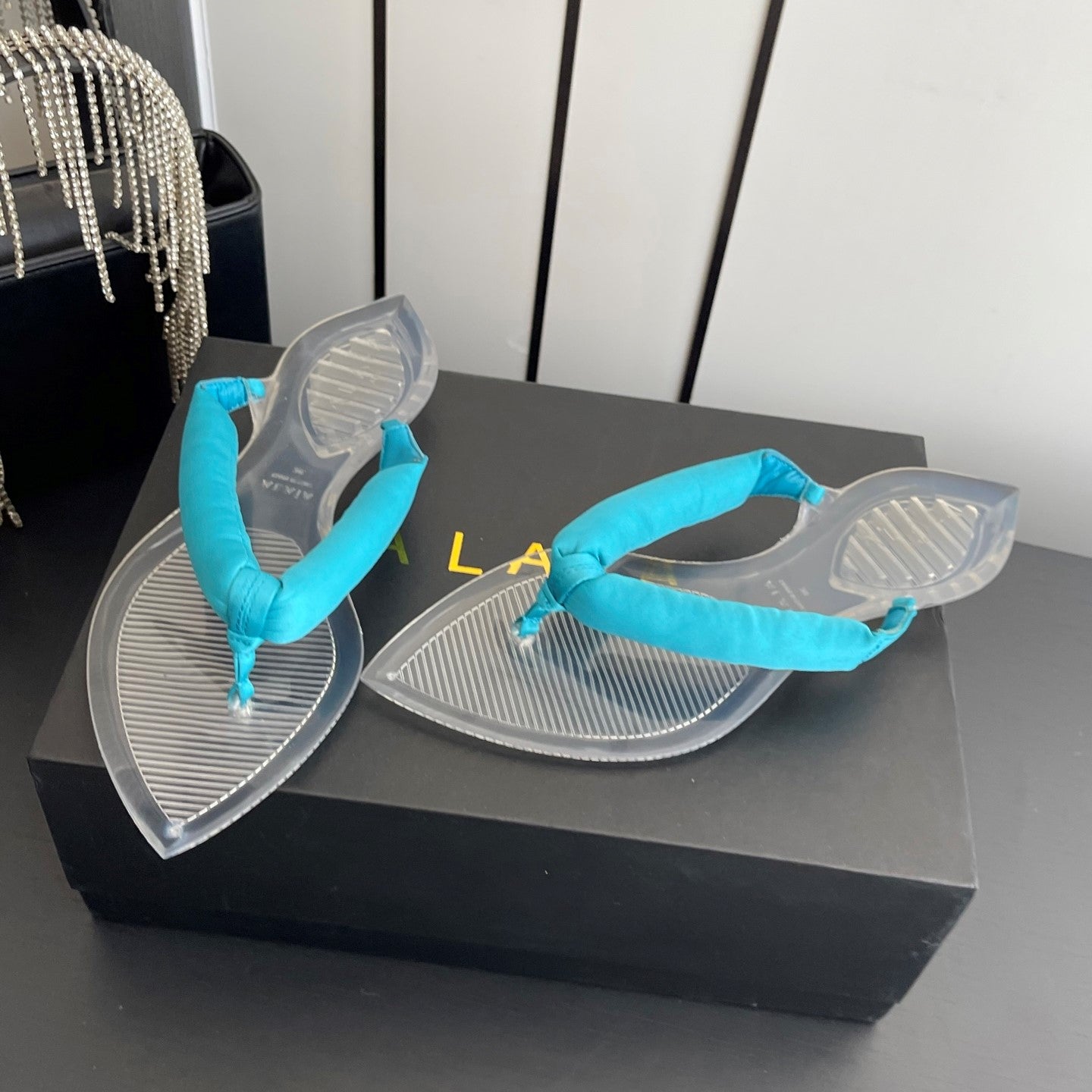 Alaïa Invisible Thong Mules Light Blue Satin 740044