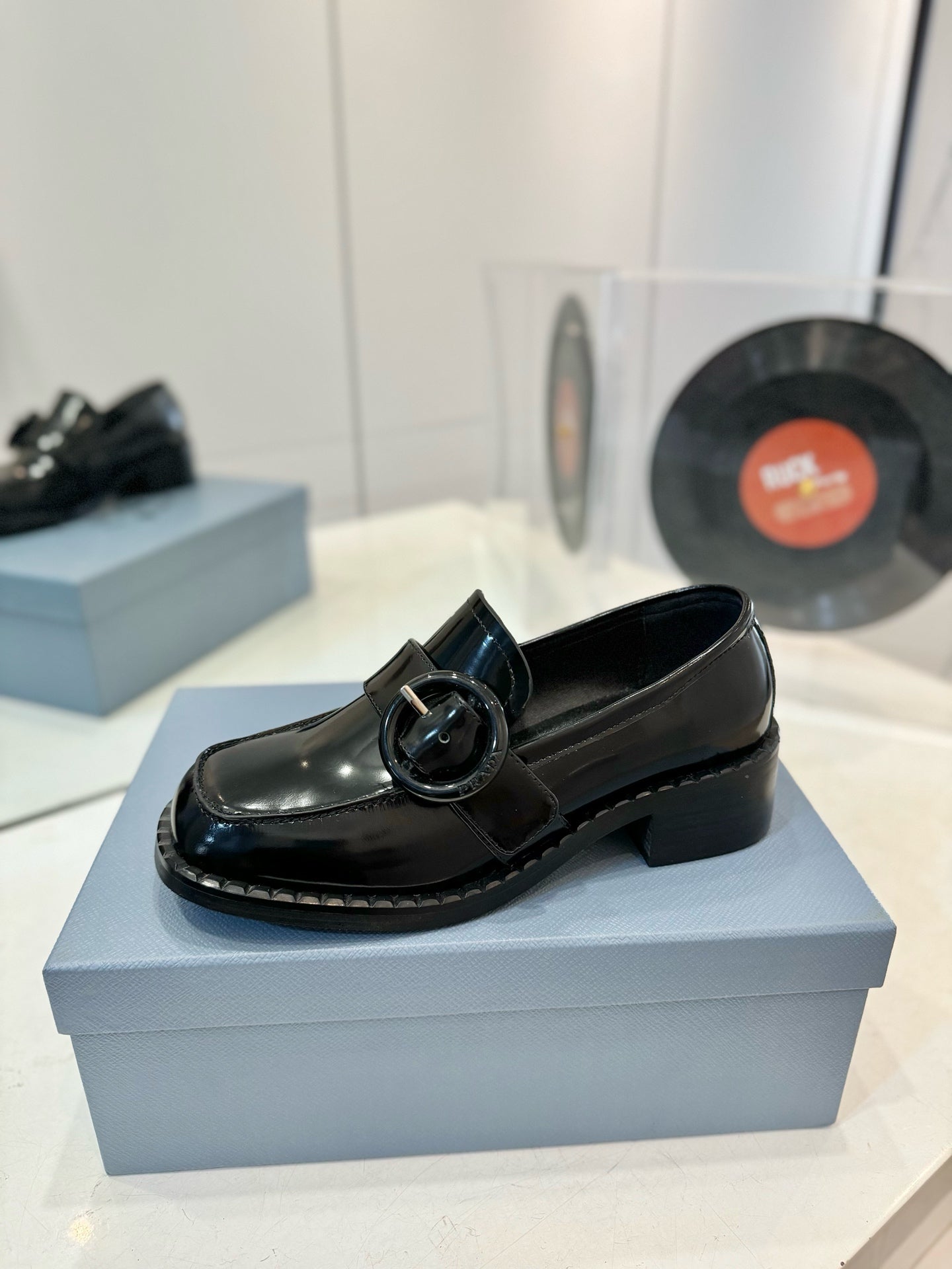 Prada 26s Heeled Loafers Black Brushed Leather 941519