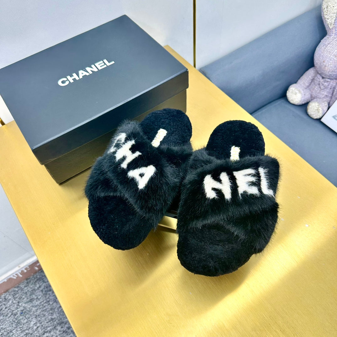 CC 26s Crisscross Sandals Black White Shearling 139990