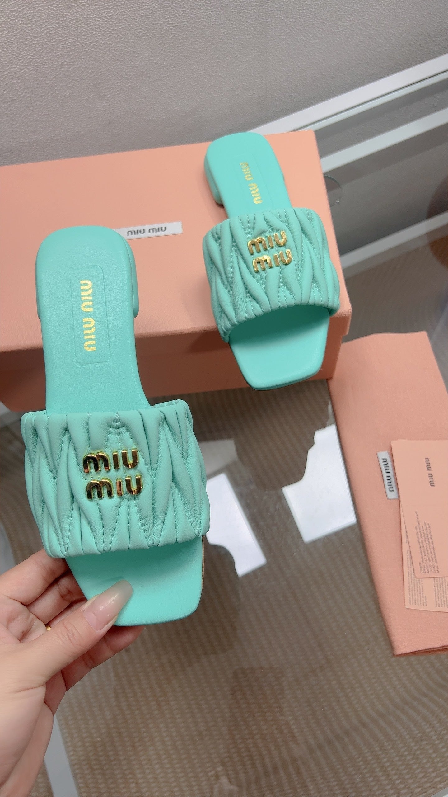 Miu Matelassé Slides Light Blue Leather 739553
