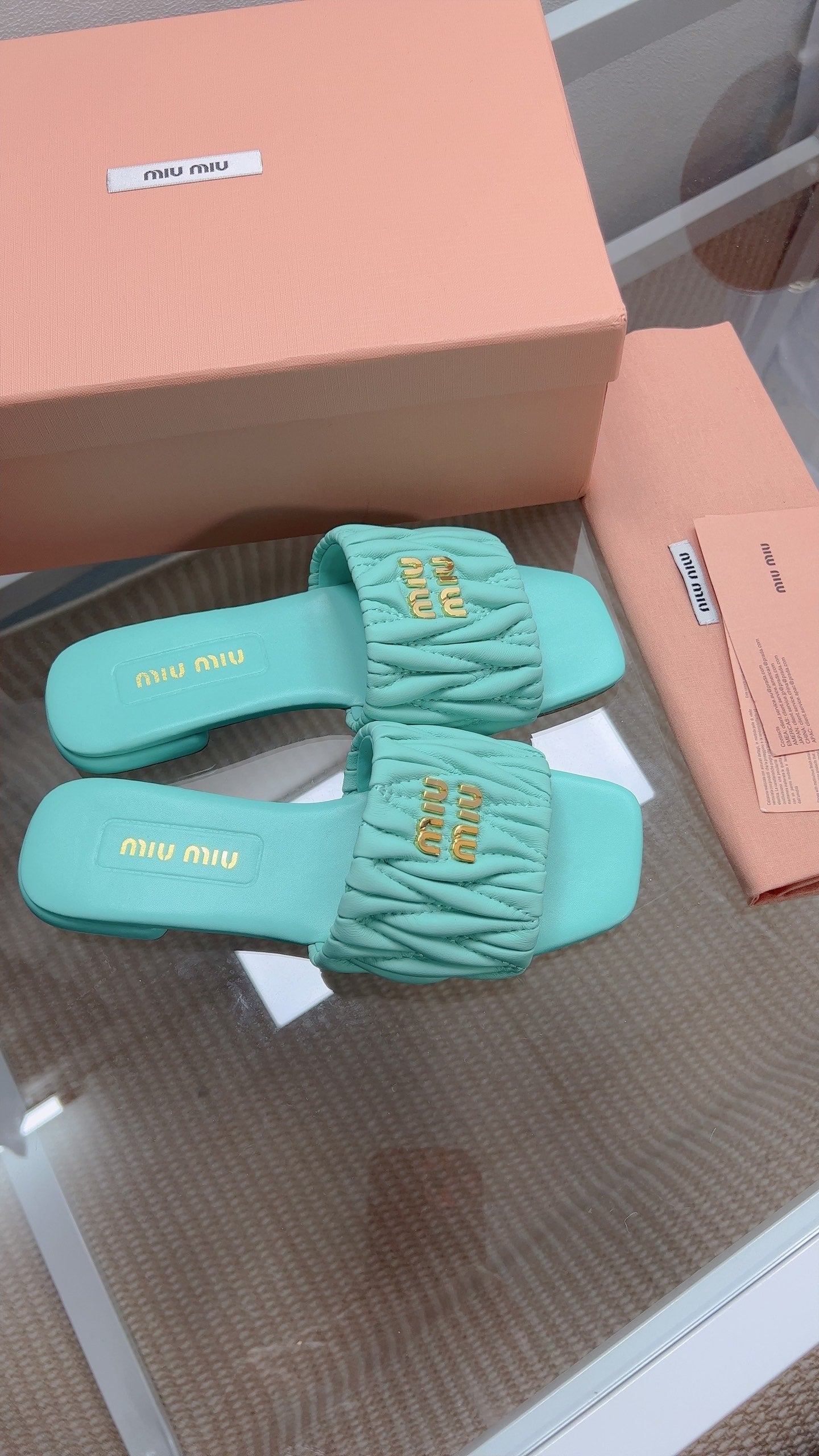 Miu Matelassé Slides Light Blue Leather 739553