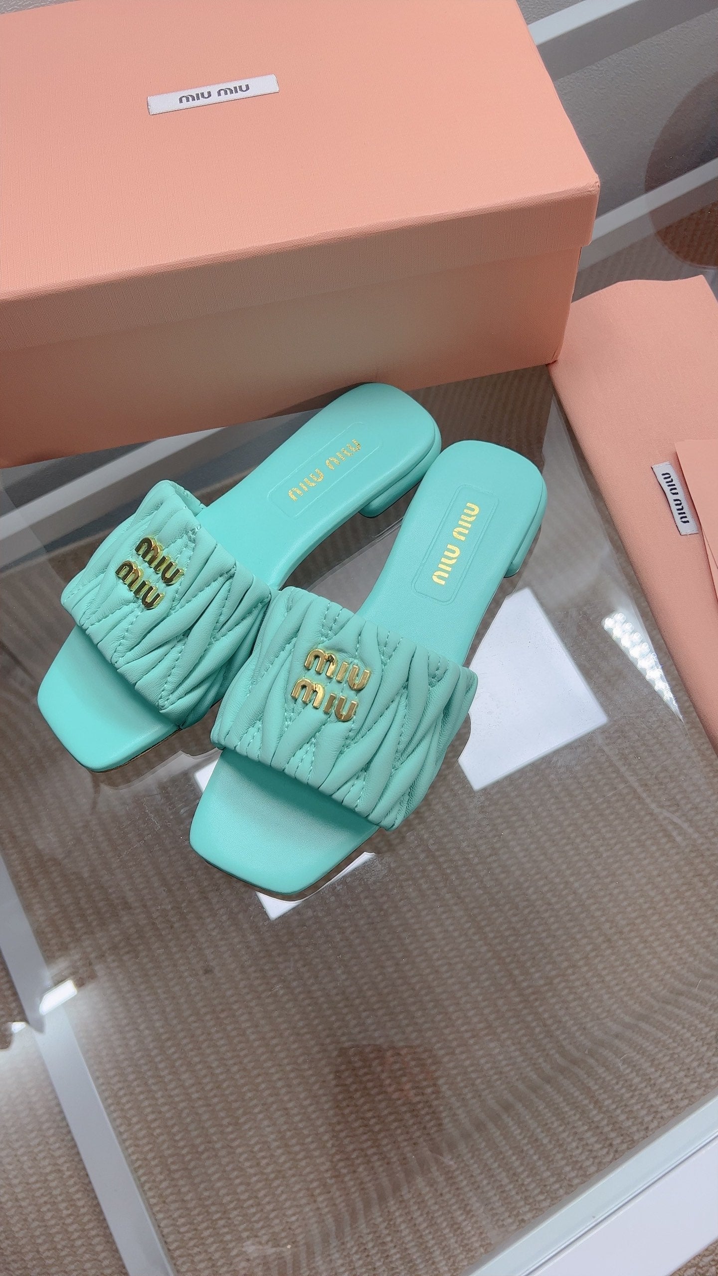 Miu Matelassé Slides Light Blue Leather 739553