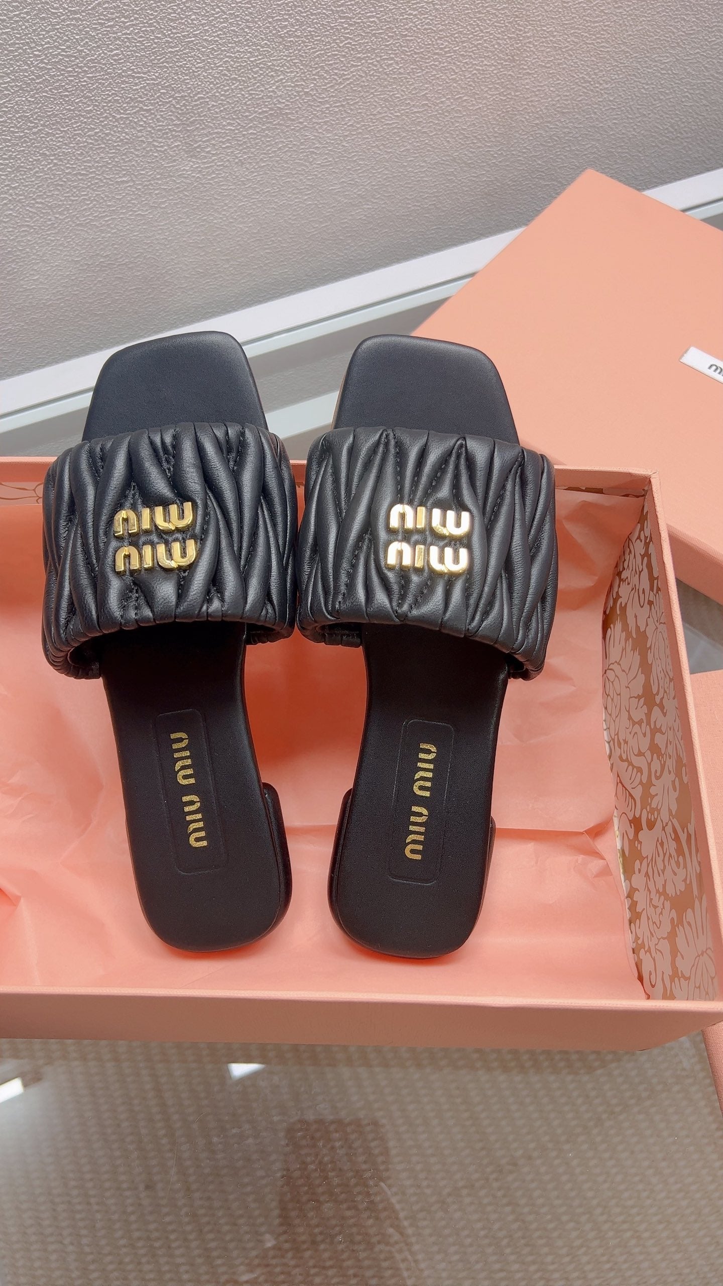 Miu Matelassé Slides Black Leather 739554