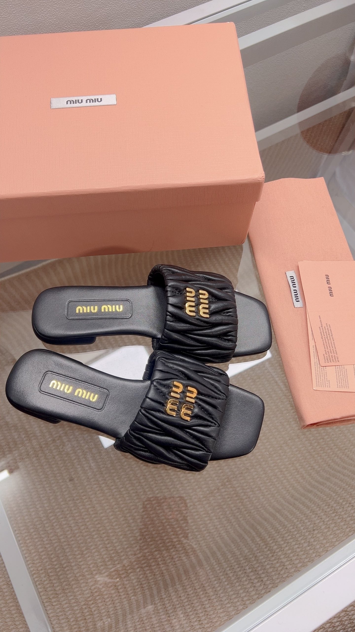 Miu Matelassé Slides Black Leather 739554