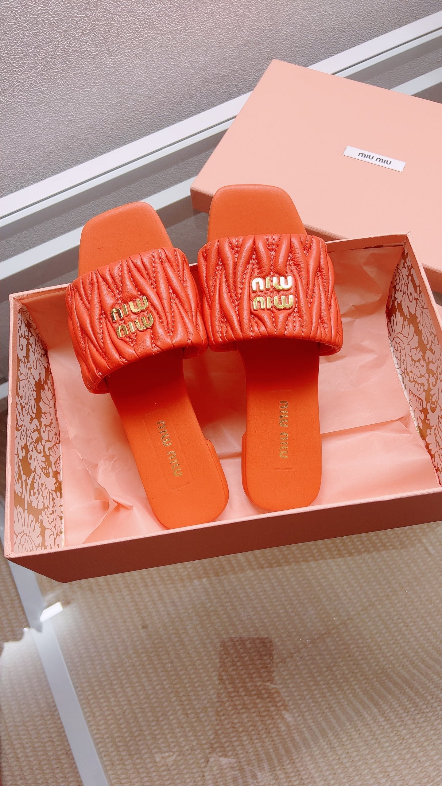 Miu Matelassé Slides Orange Leather 739556