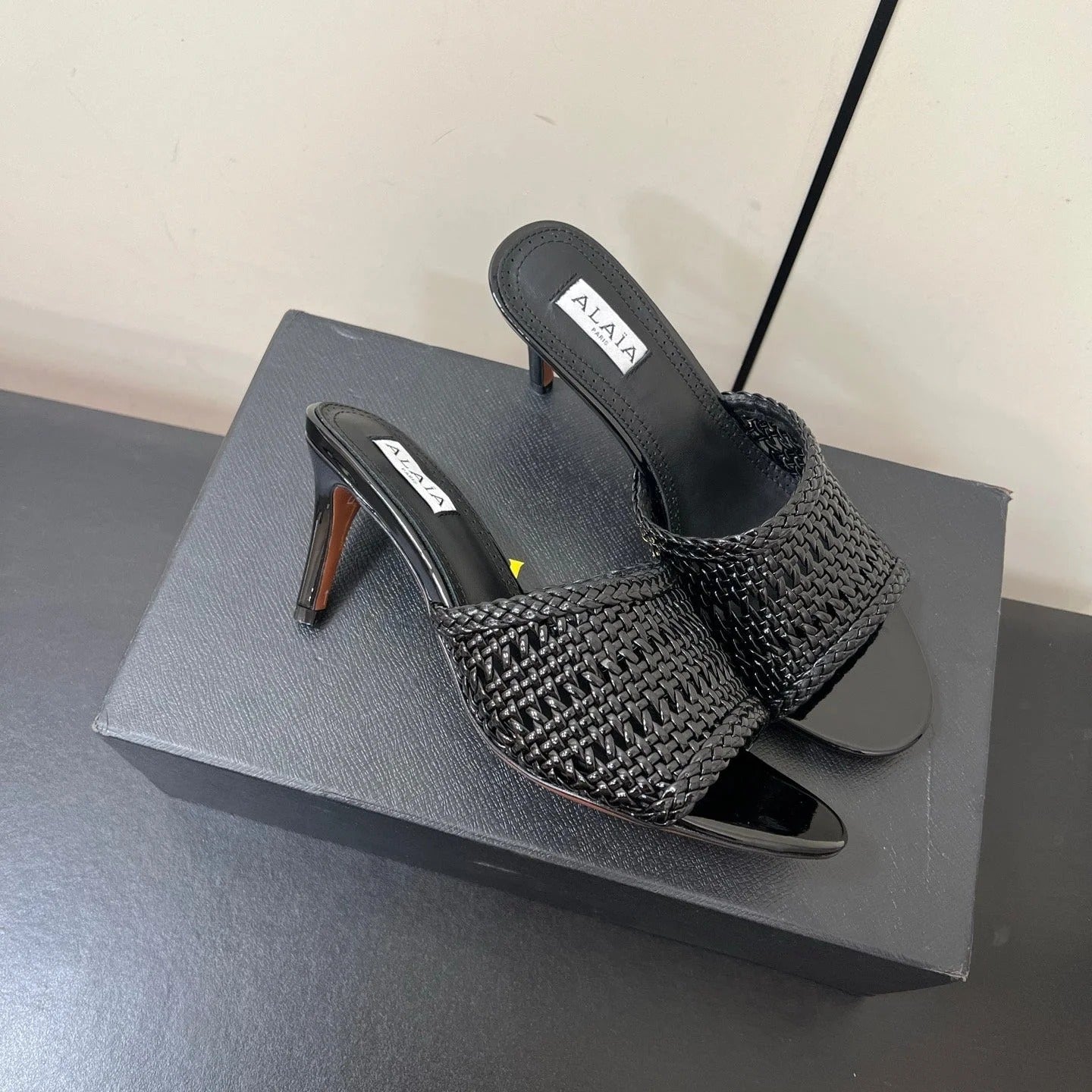 Alaia High Heel 25s 70 Mm In Black Lambskin With Woven Pattern