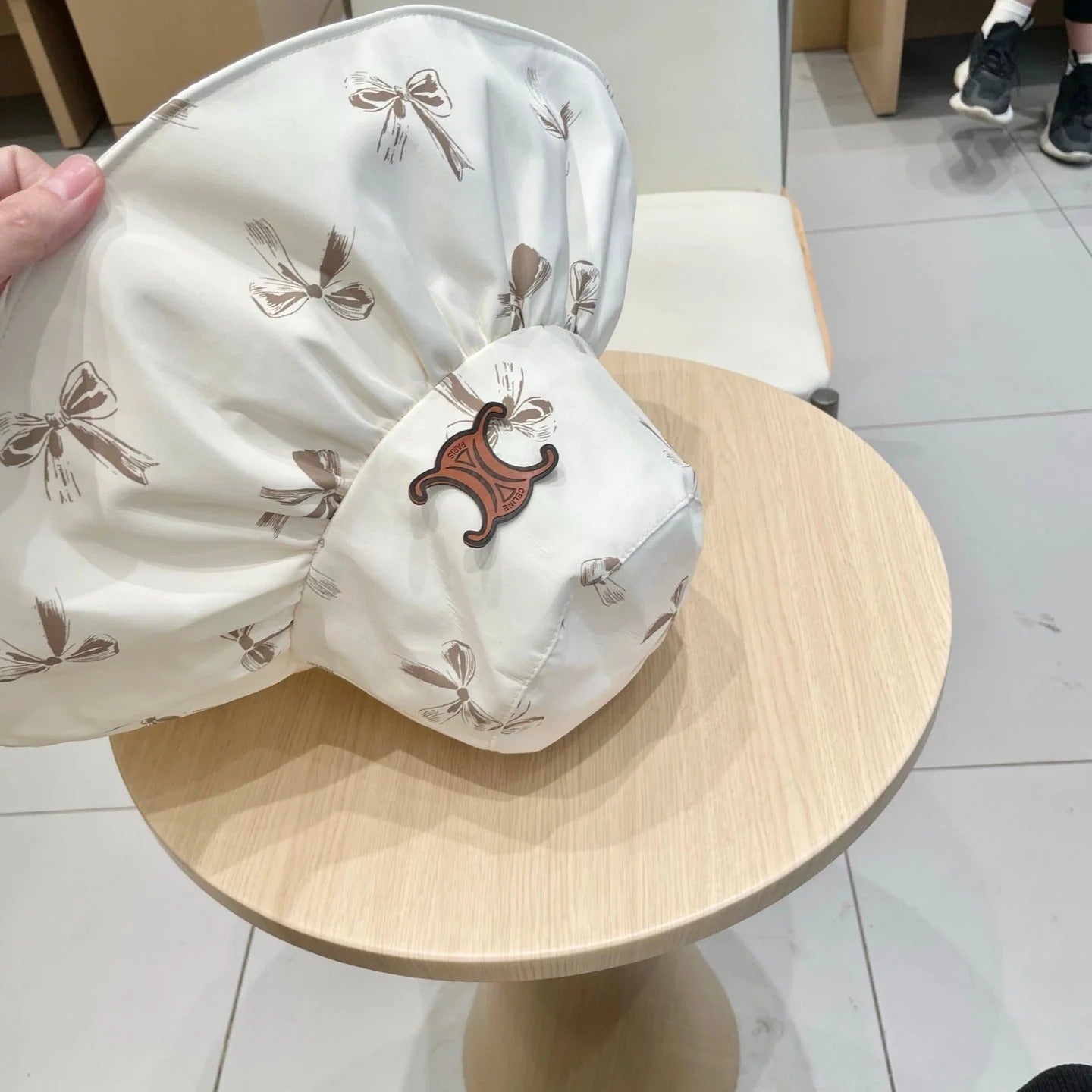 CELINE 25S BUCKET BOW HAT 733404 IN IVORY