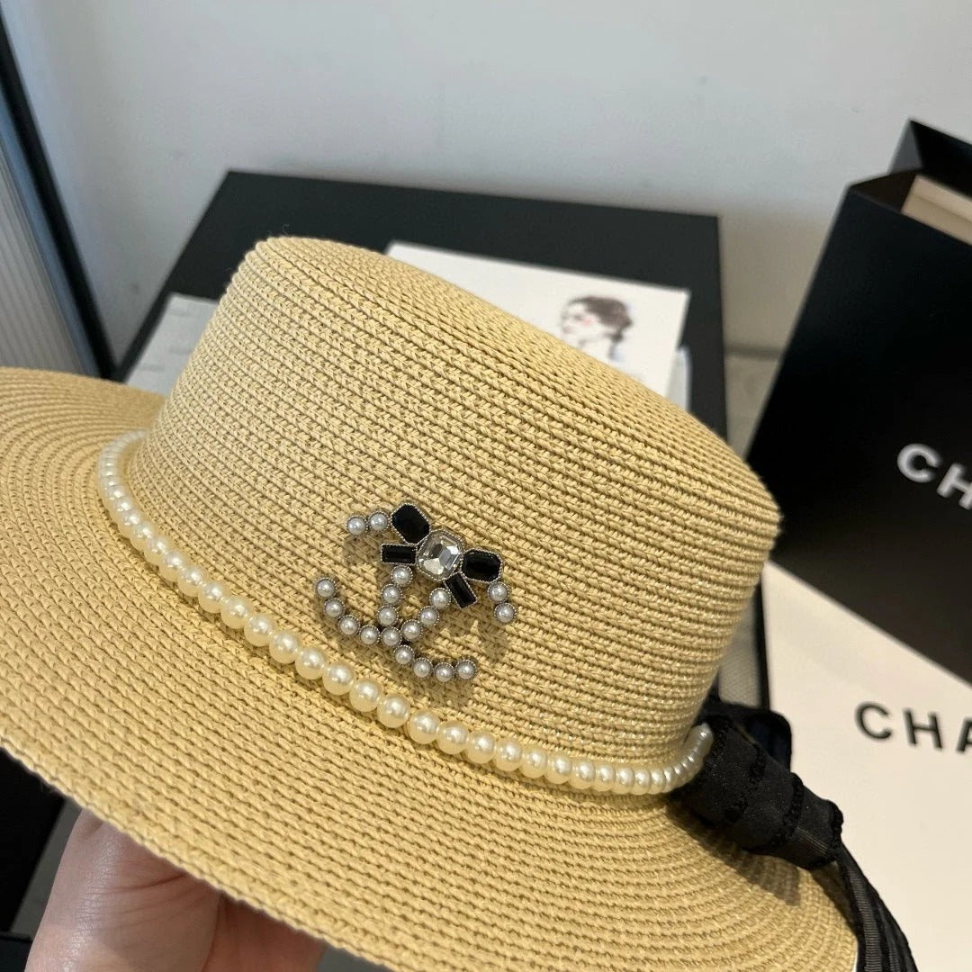 FLAT STRAW HAT WITH BOW BLACK 673921