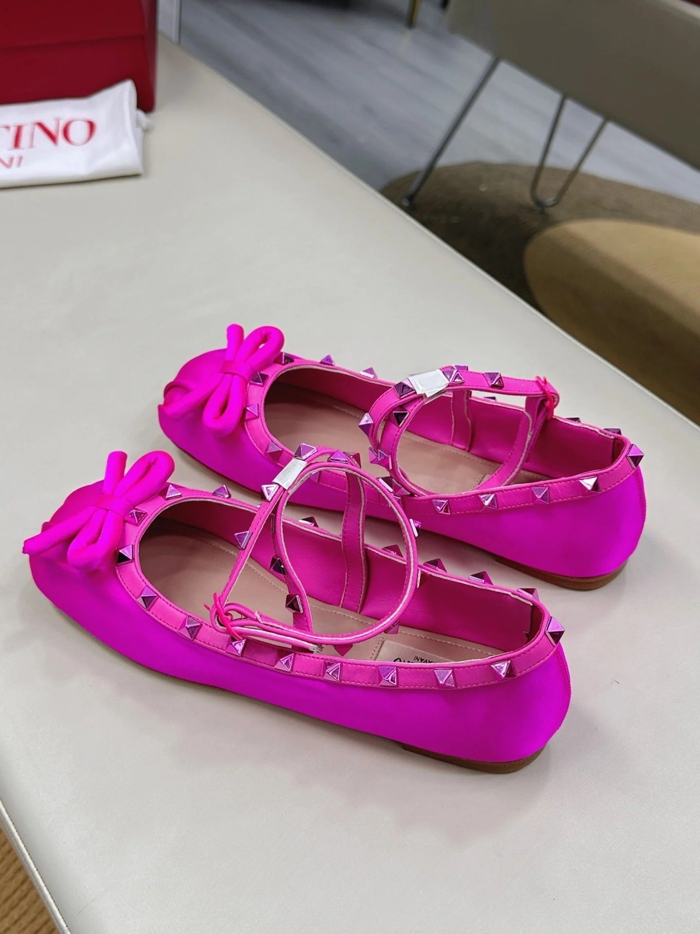 VALEN GARAVANI ROCKSTUD BALLERINAS IN HOT PINK SATIN
