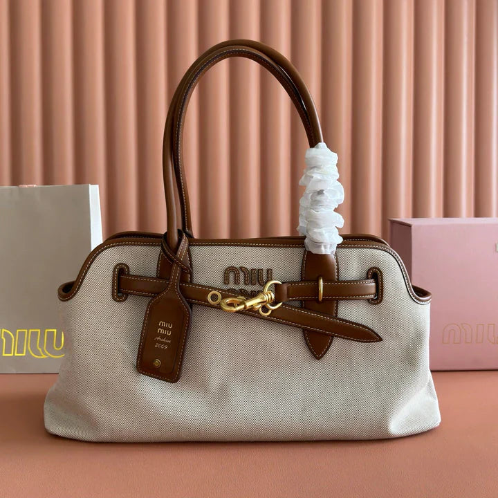 Miu Miu Aventure Handbag 44 Beige in Canvas 285306