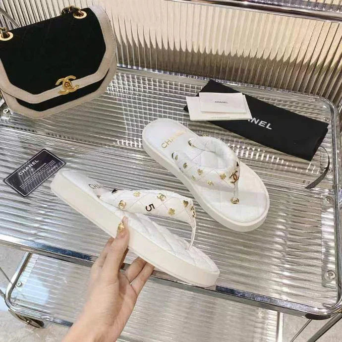 Chanel 2026 Thong Sandals Lambskin Leather Gold-Tone Charm Details 791138